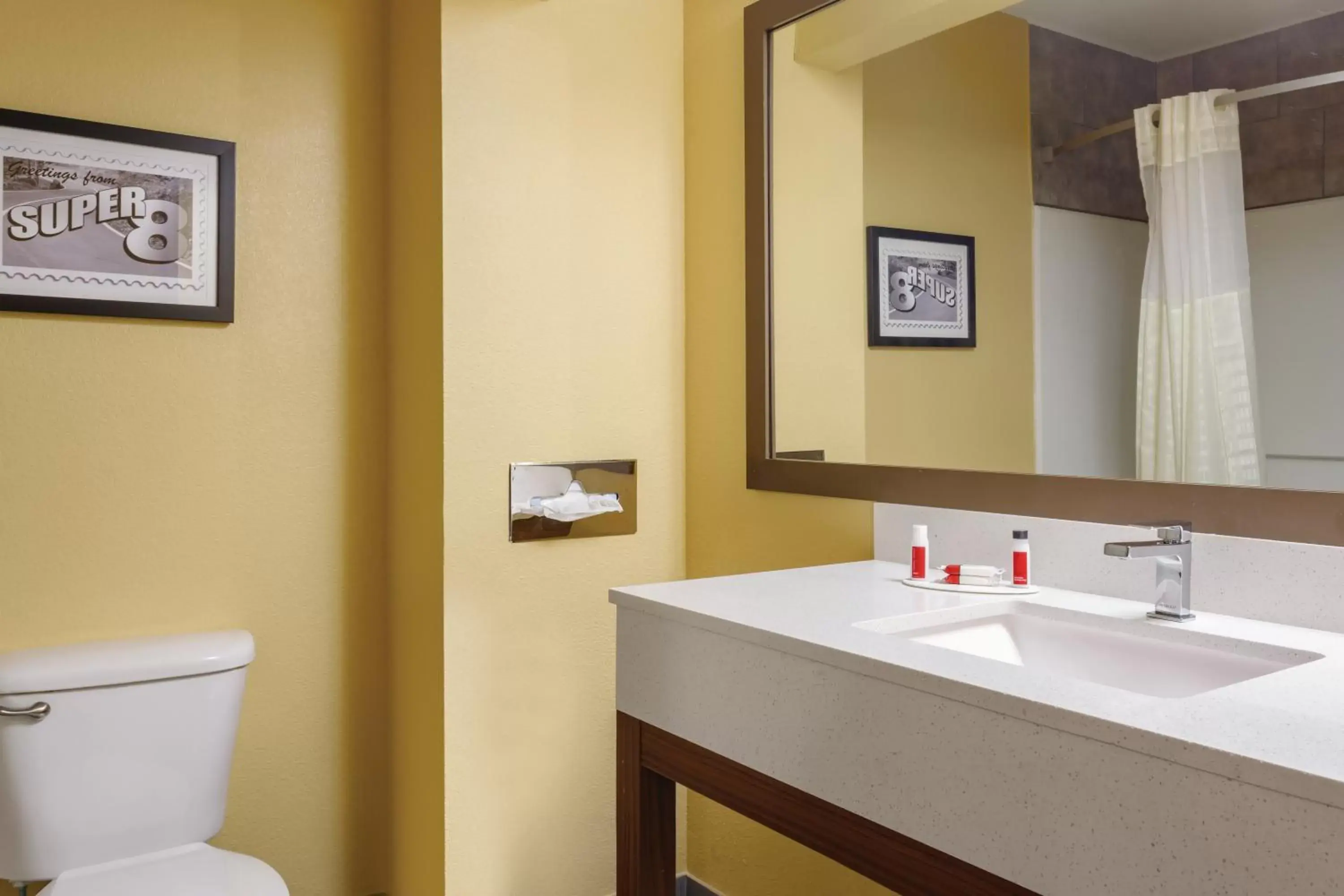 Bathroom in Super 8 by Wyndham Olive Branch