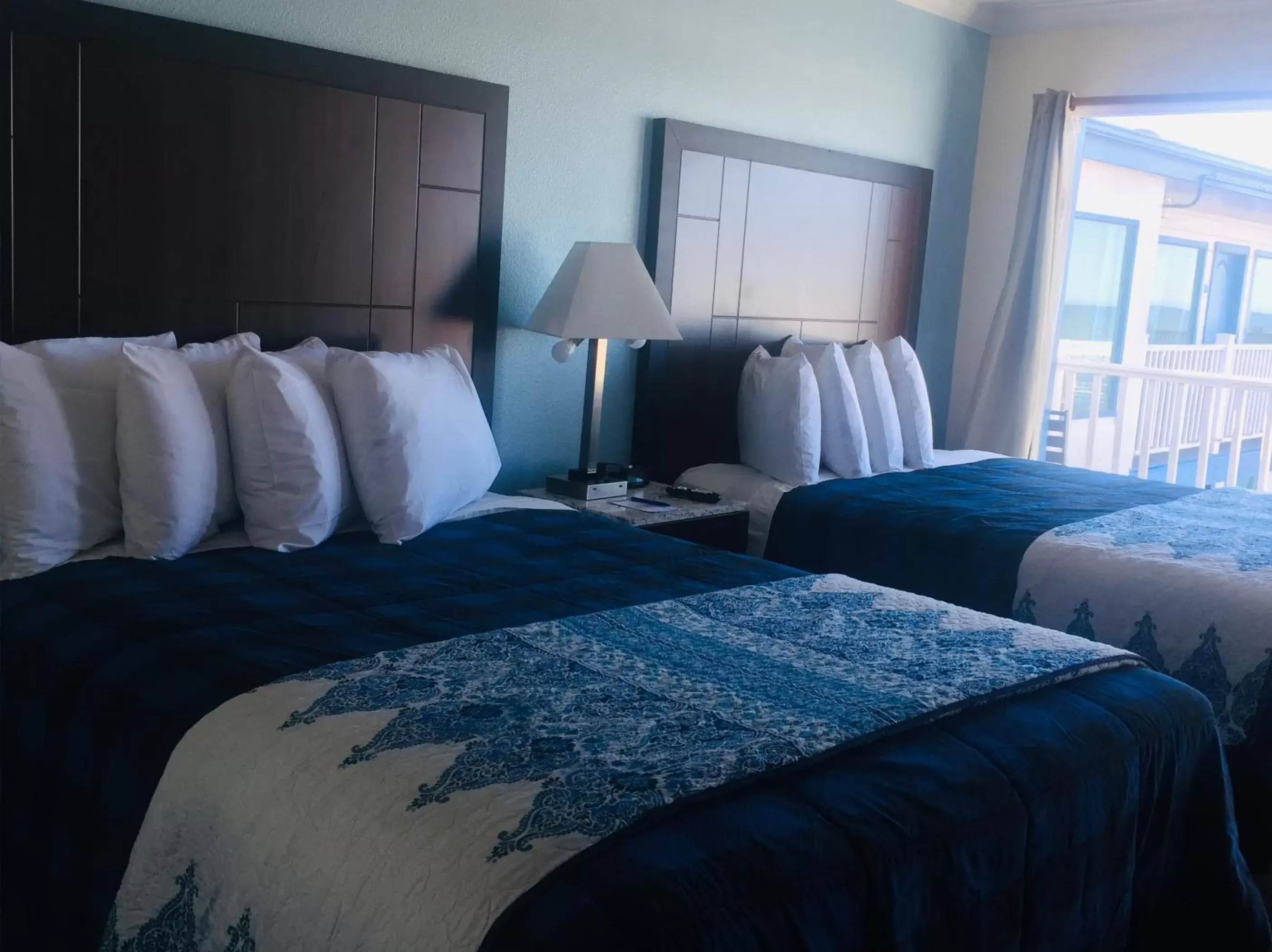 Bed in Dolphin Cove Motel