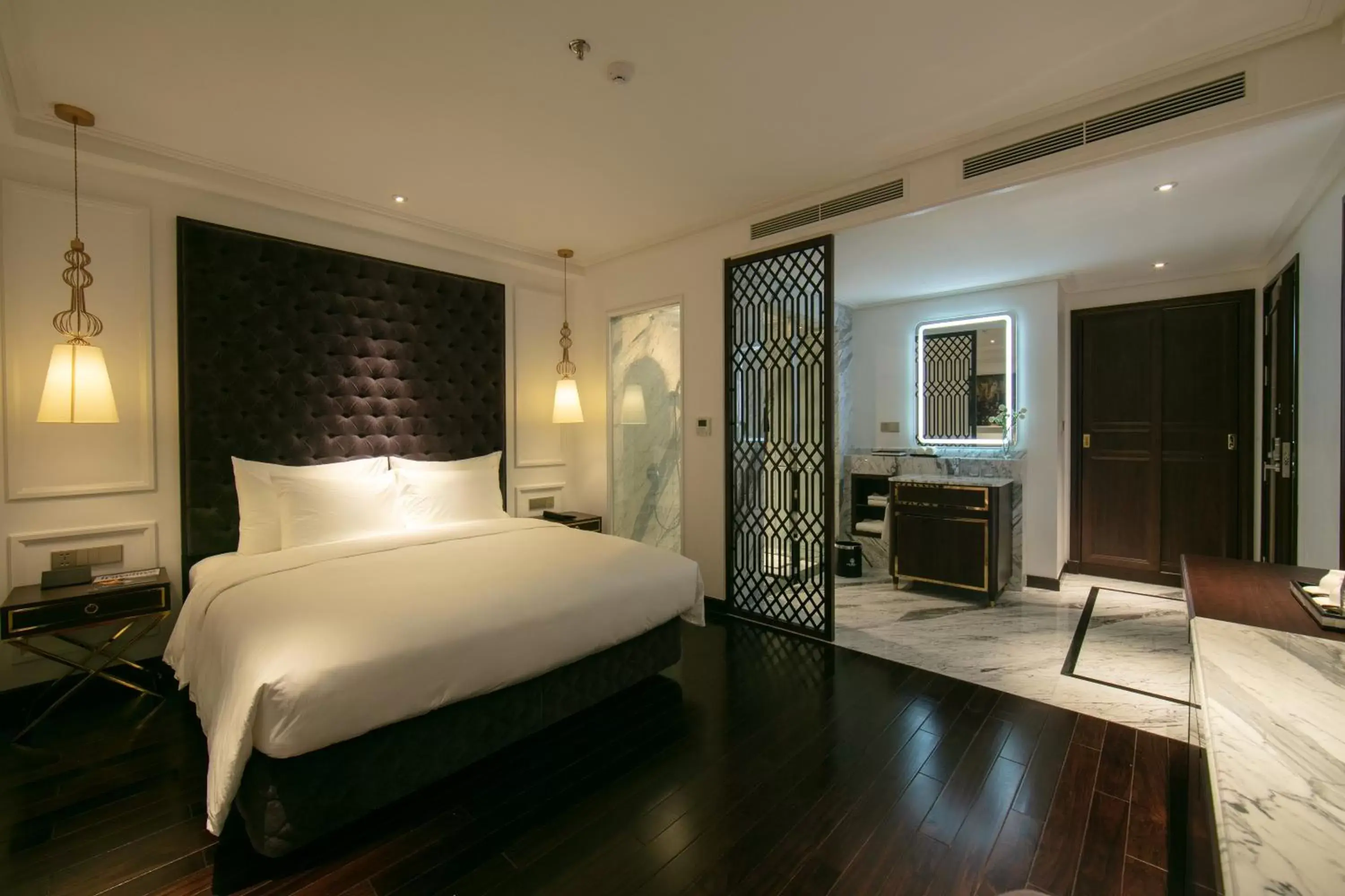 Bed in Anatole Hotel Hanoi