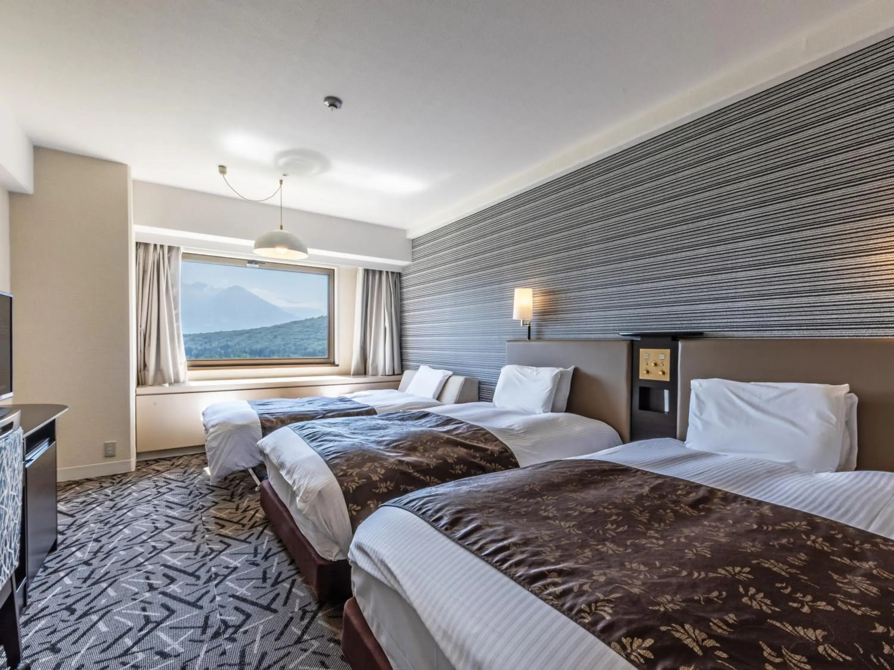 Photo of the whole room, Bed in APA Hotel & Resort Joetsu Myoko