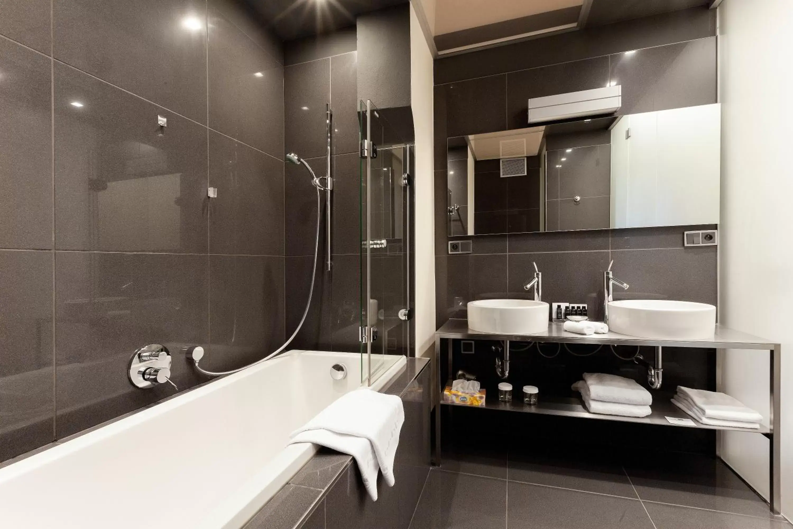 Bathroom in Old Town Square Residence by Emblem