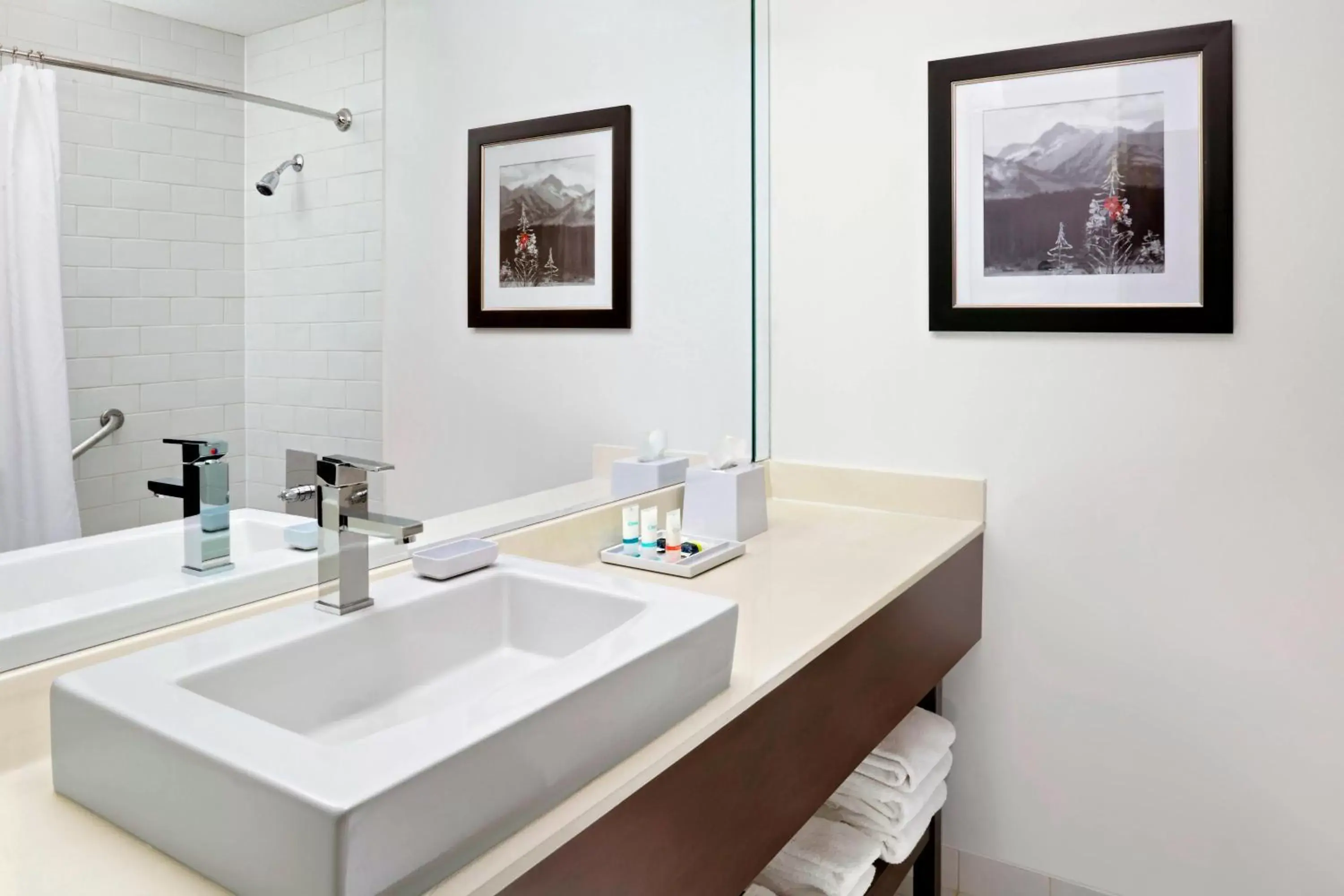 Bathroom in Four Points by Sheraton Hotel & Suites Calgary West