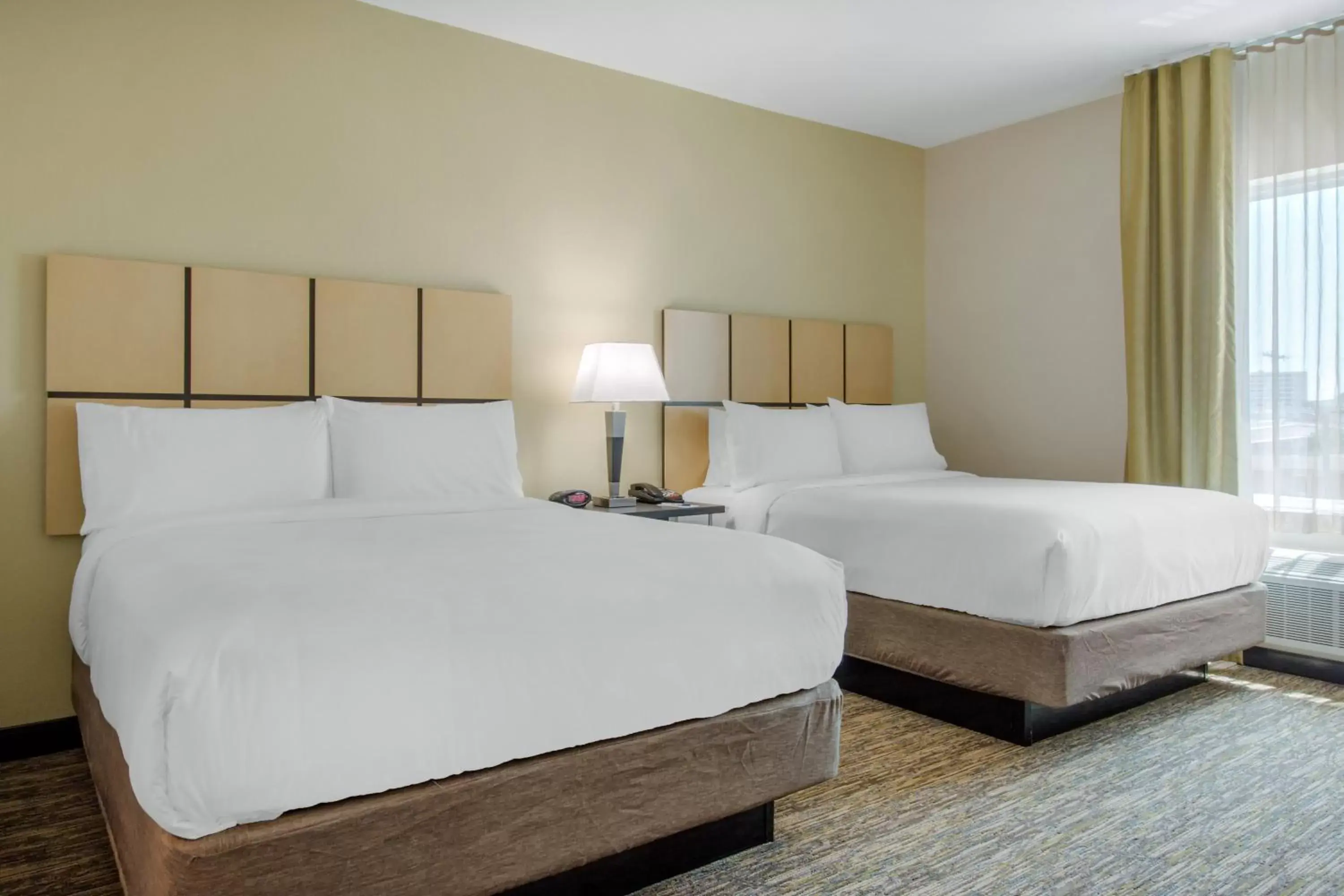 Photo of the whole room, Bed in Candlewood Suites - San Antonio Lackland AFB Area, an IHG Hotel