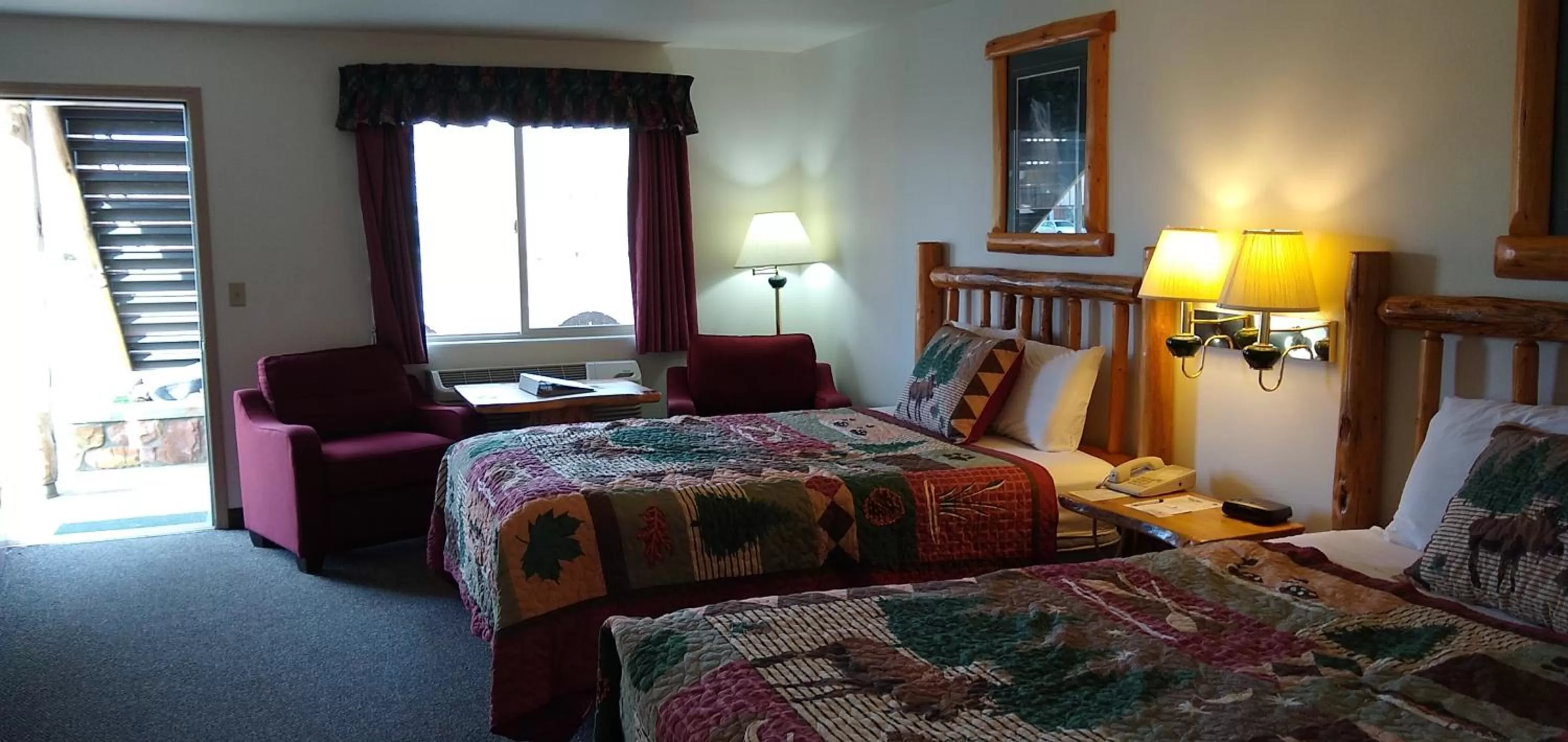 Bed in Ponderosa Motel