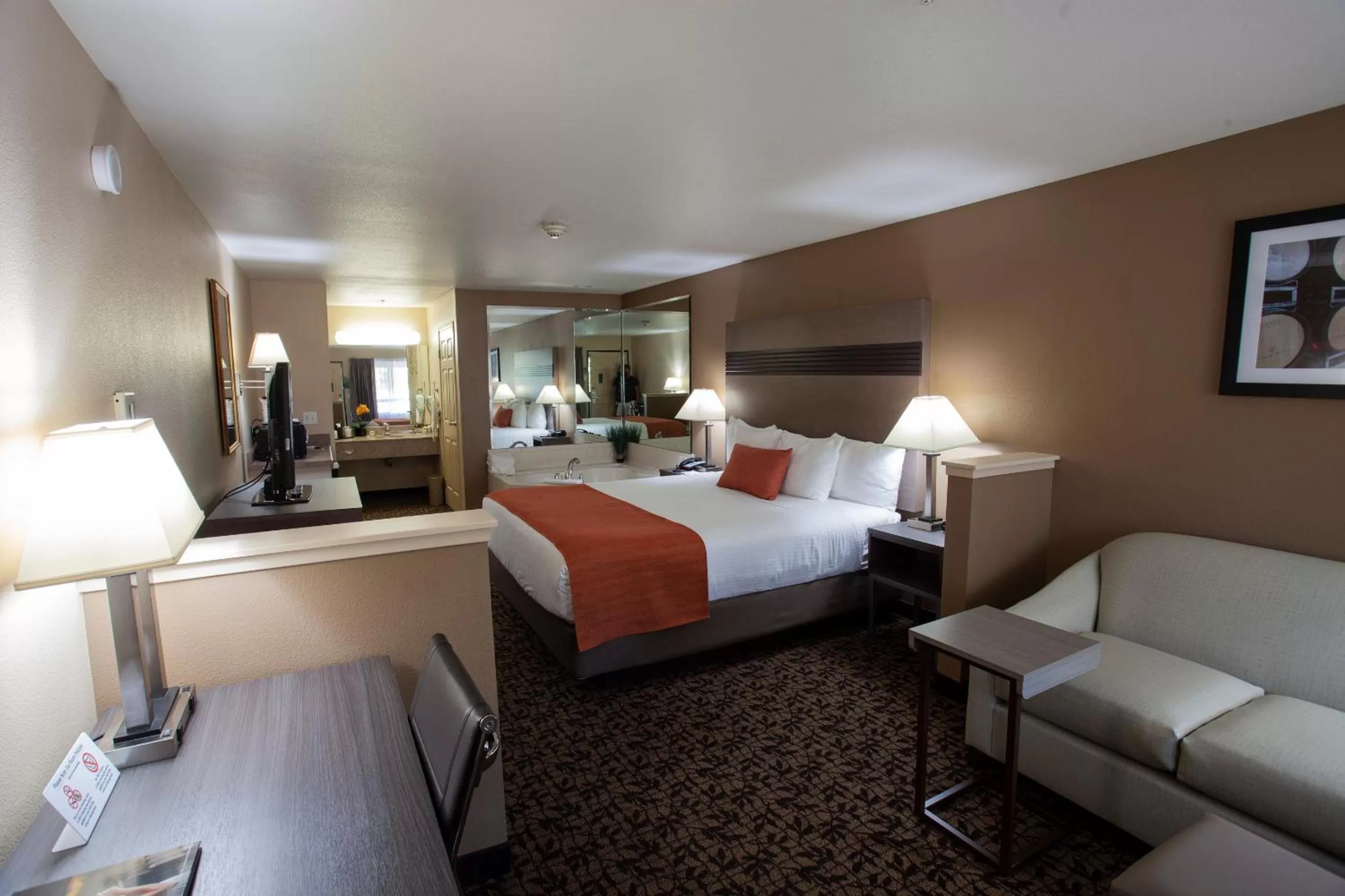 Bed in Hawthorn Suites by Wyndham Napa Valley