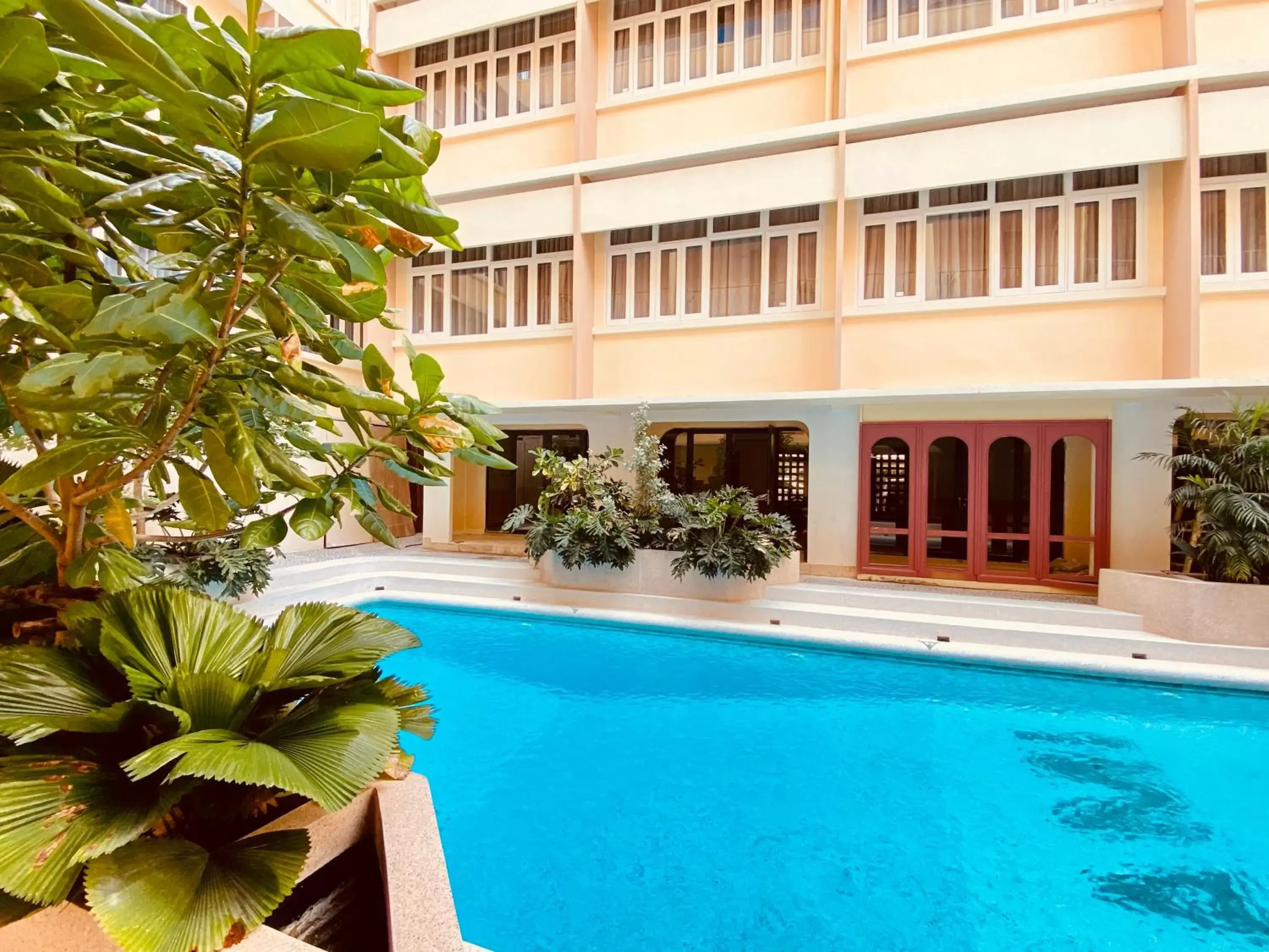 Property building, Swimming Pool in Miami Hotel Bangkok - SHA Plus