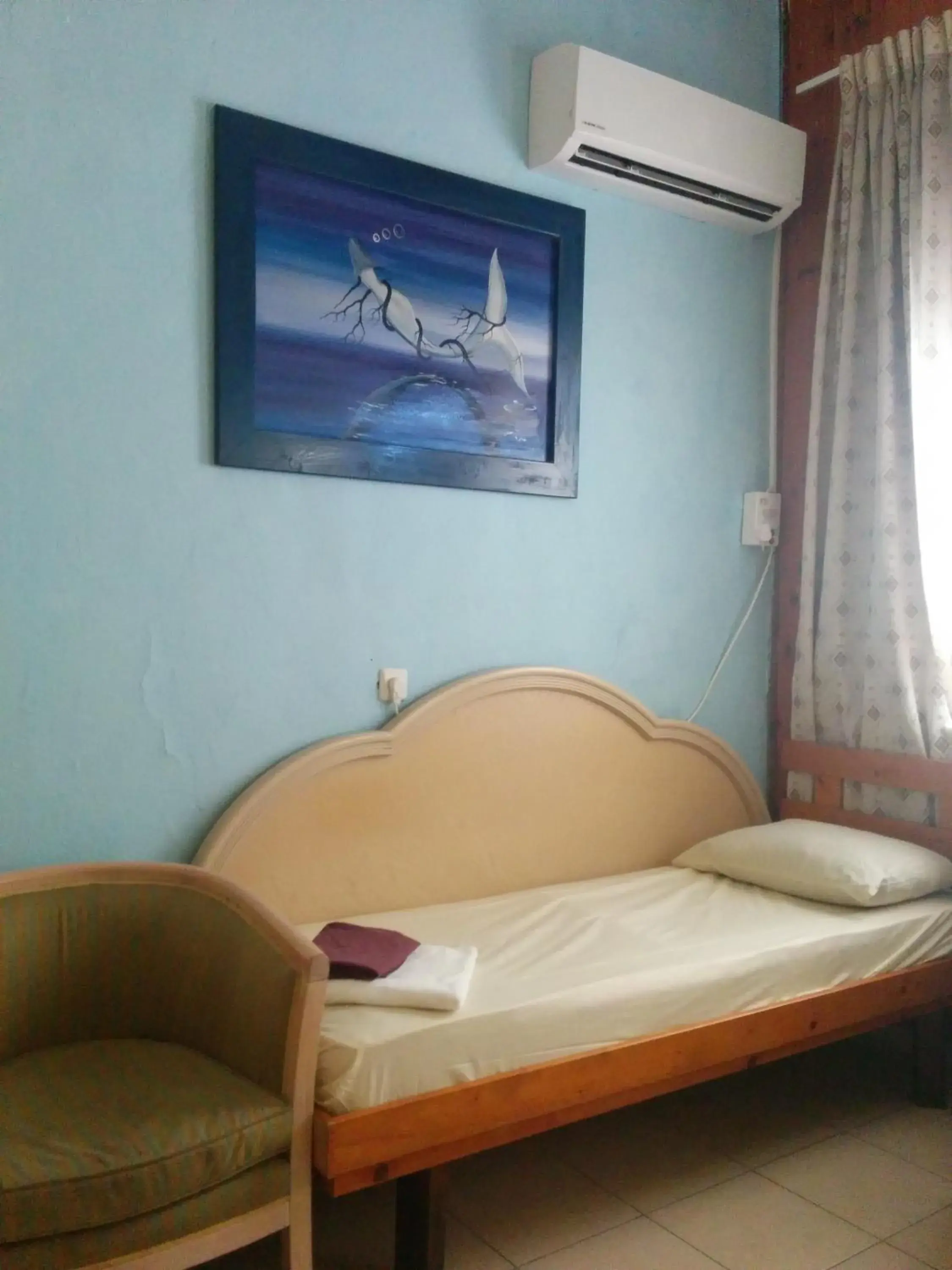 Seating area, Bed in Momos Hostel