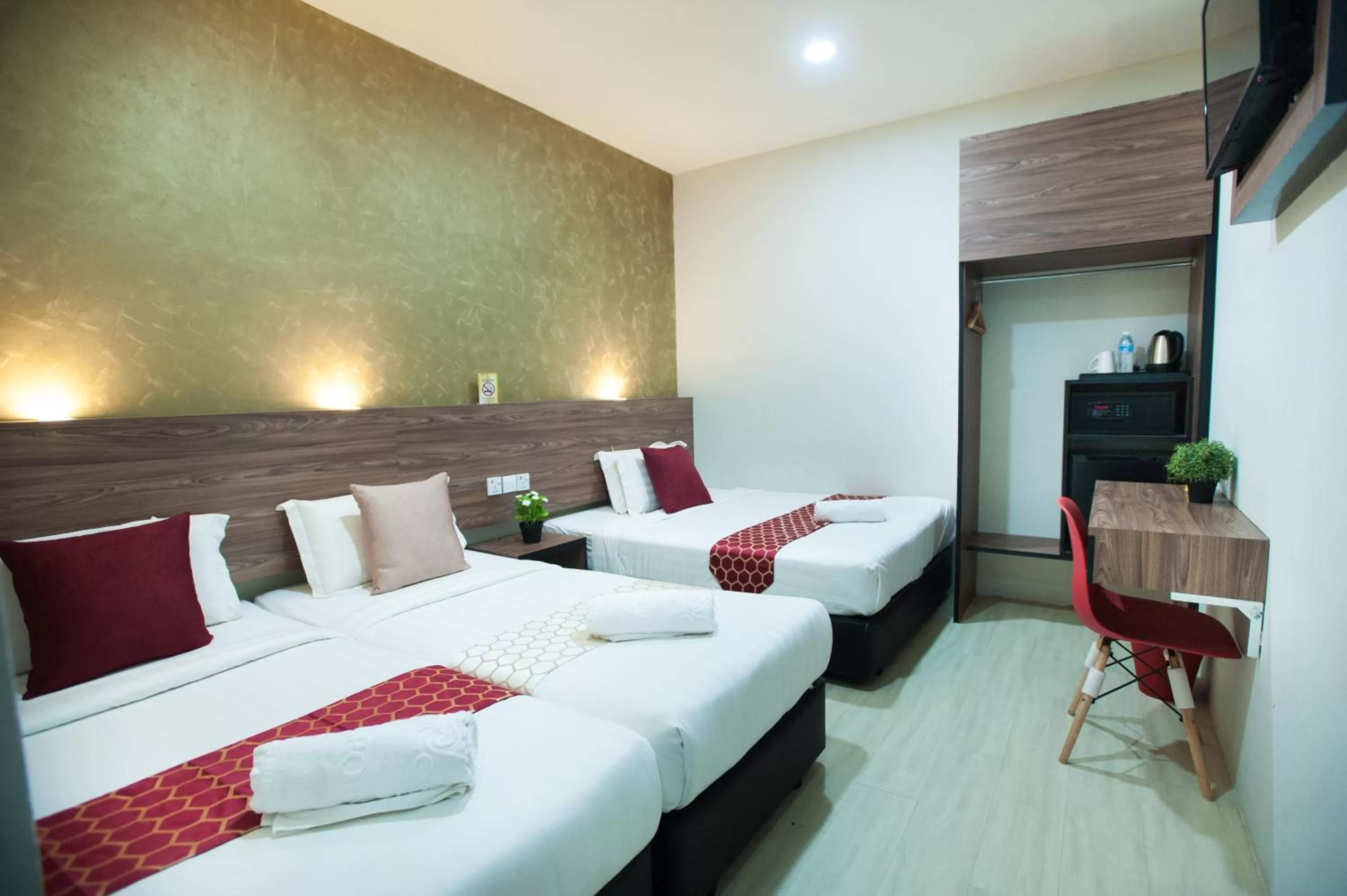 Bed in DJ Citi Point Hotel