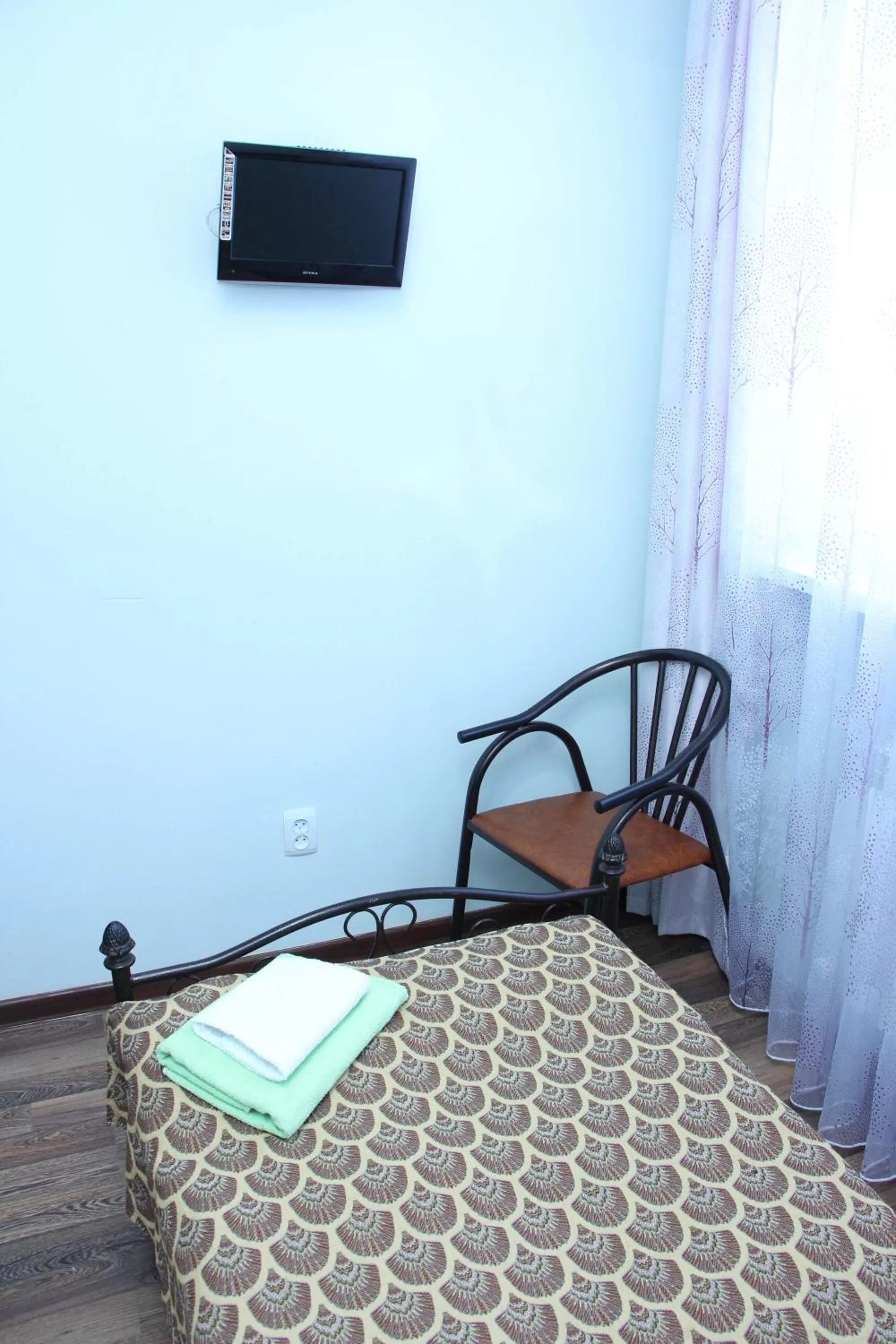 Bed in Zhaylau Hotel