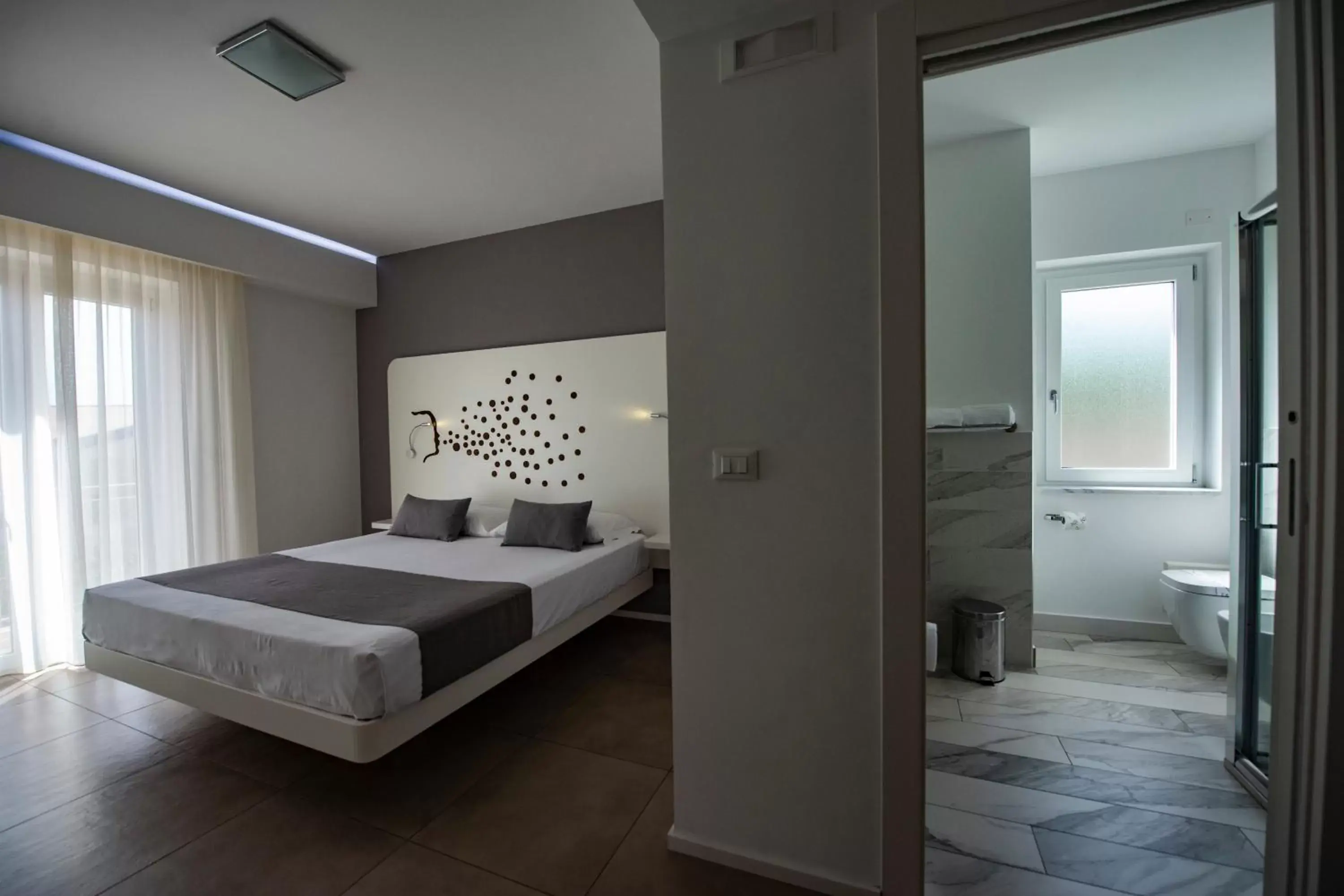 Bed in Aether Suites Tropea - Free Parking