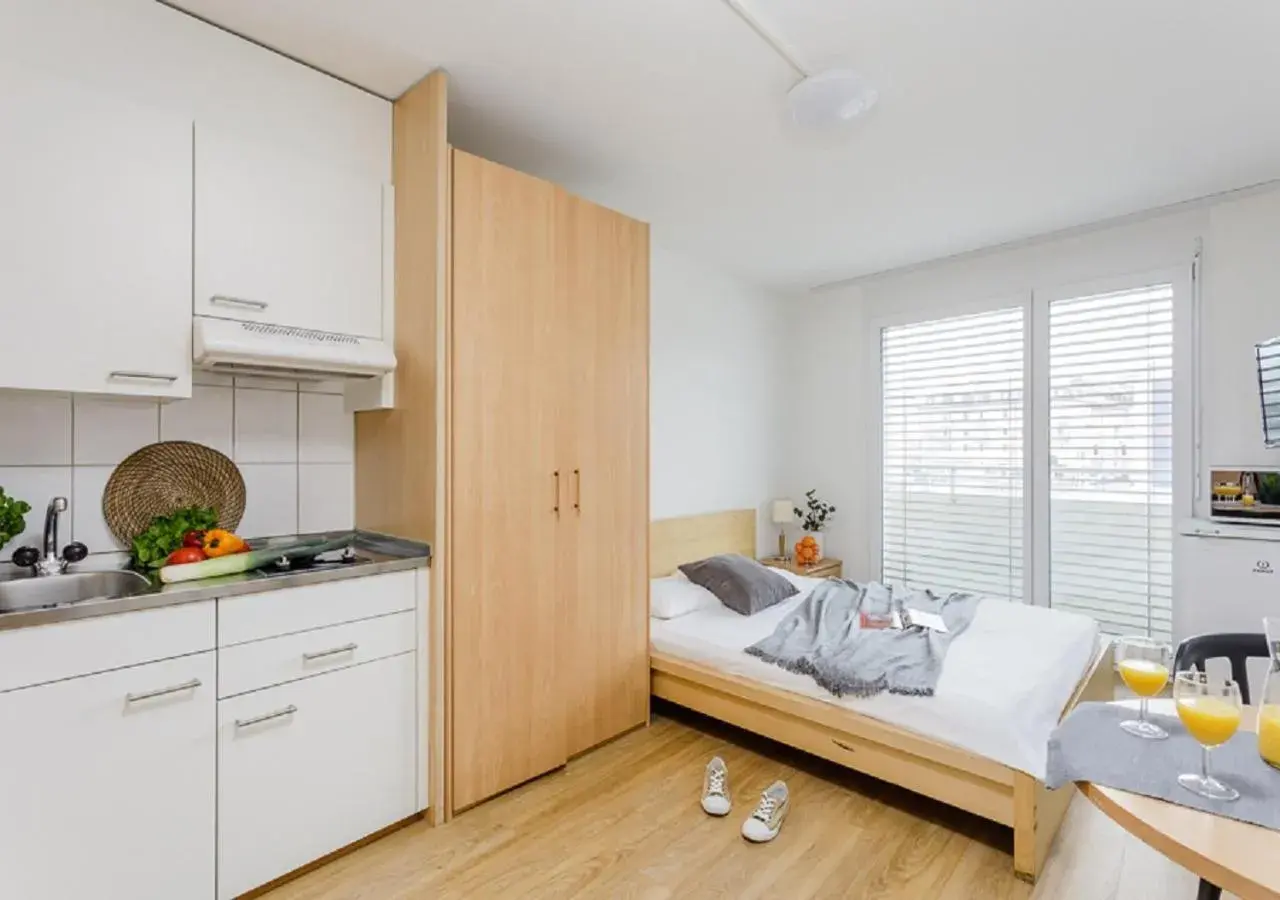 Photo of the whole room, Kitchen/Kitchenette in Swiss Star Tower - contactless self check-in