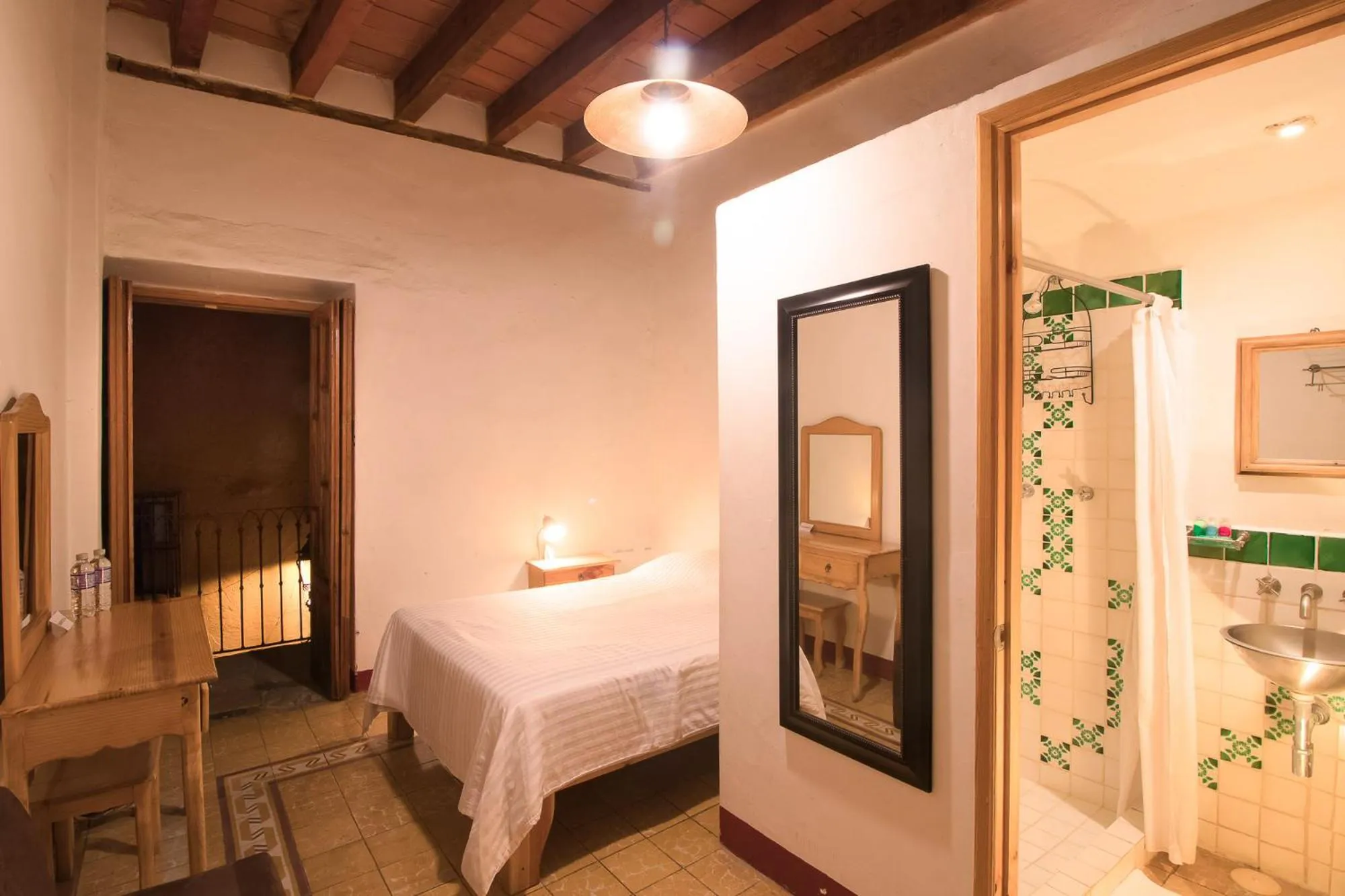 Bed in Hotel Meson Cuevano