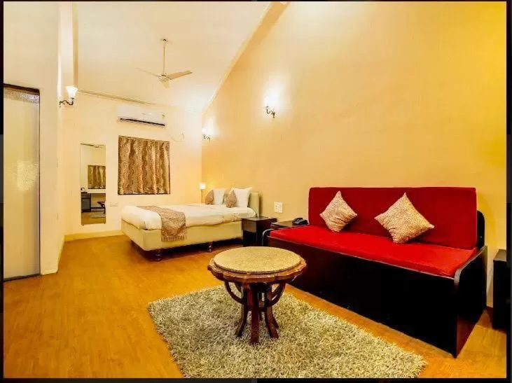 Living room, Bed in The Center Court Resort & Spa