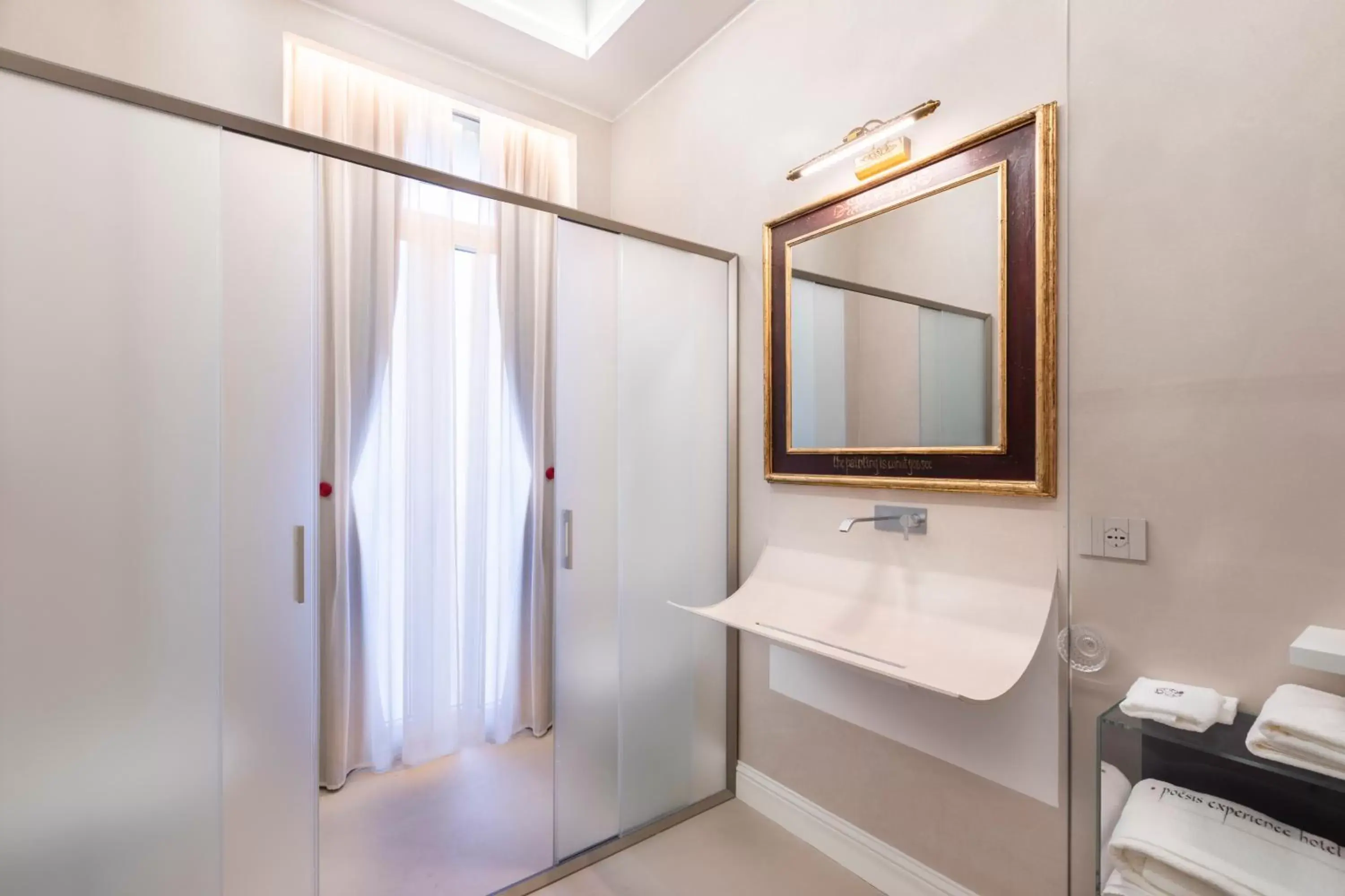 Bathroom in Poēsis Experience Hotel