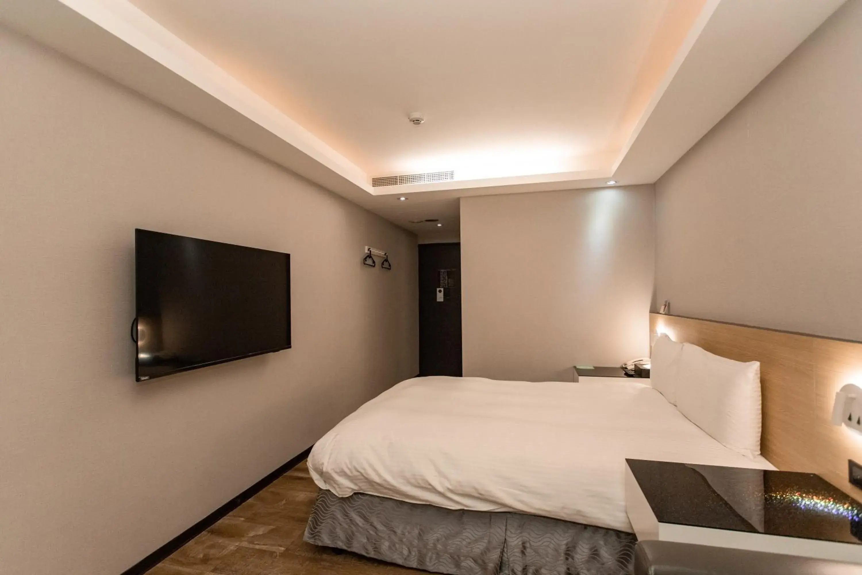 Bed in Hub Hotel Tucheng