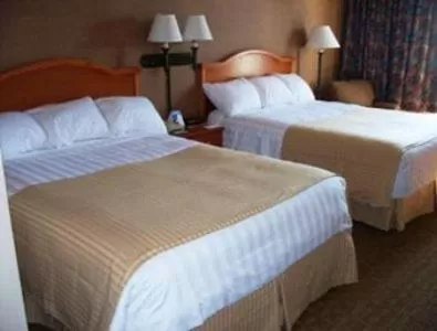 Bed in Ramada by Wyndham Watertown Thousand