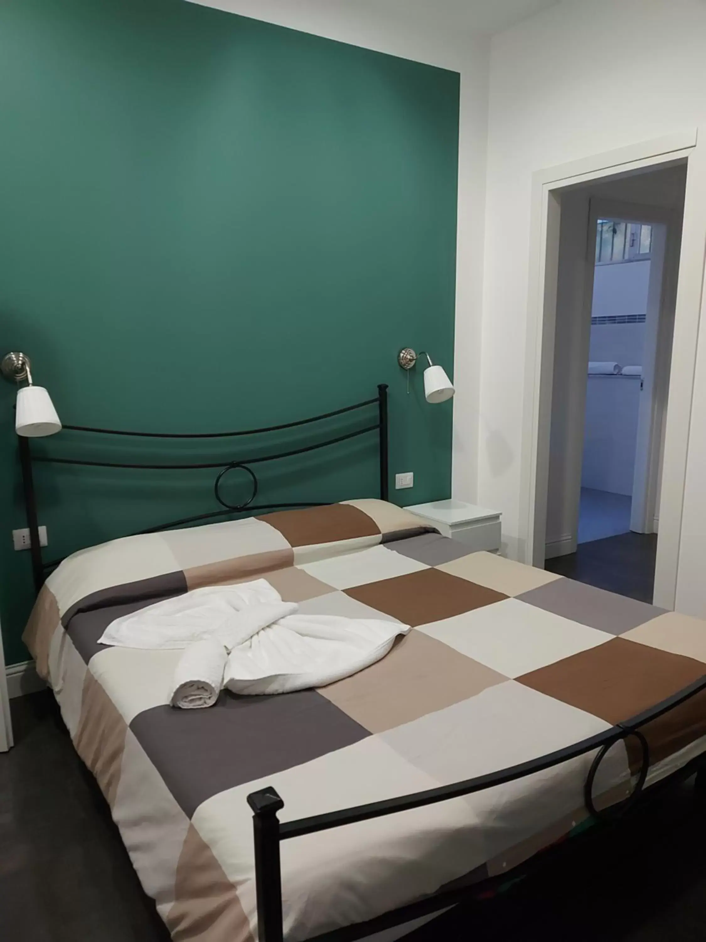 Photo of the whole room, Bed in B&B Giardino Bellini-centro