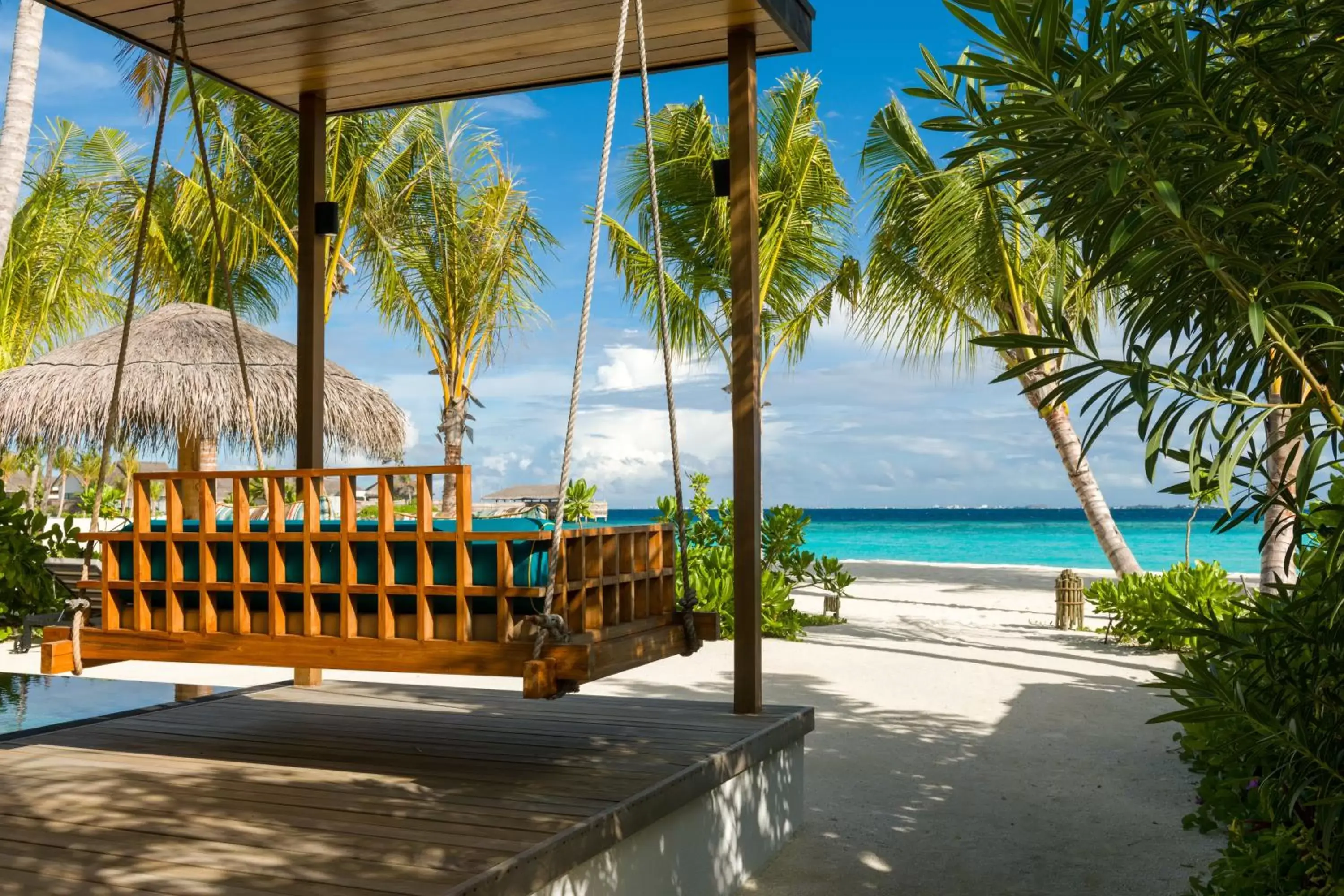 Balcony/Terrace, Beach in Hilton Maldives Amingiri Resort & Spa