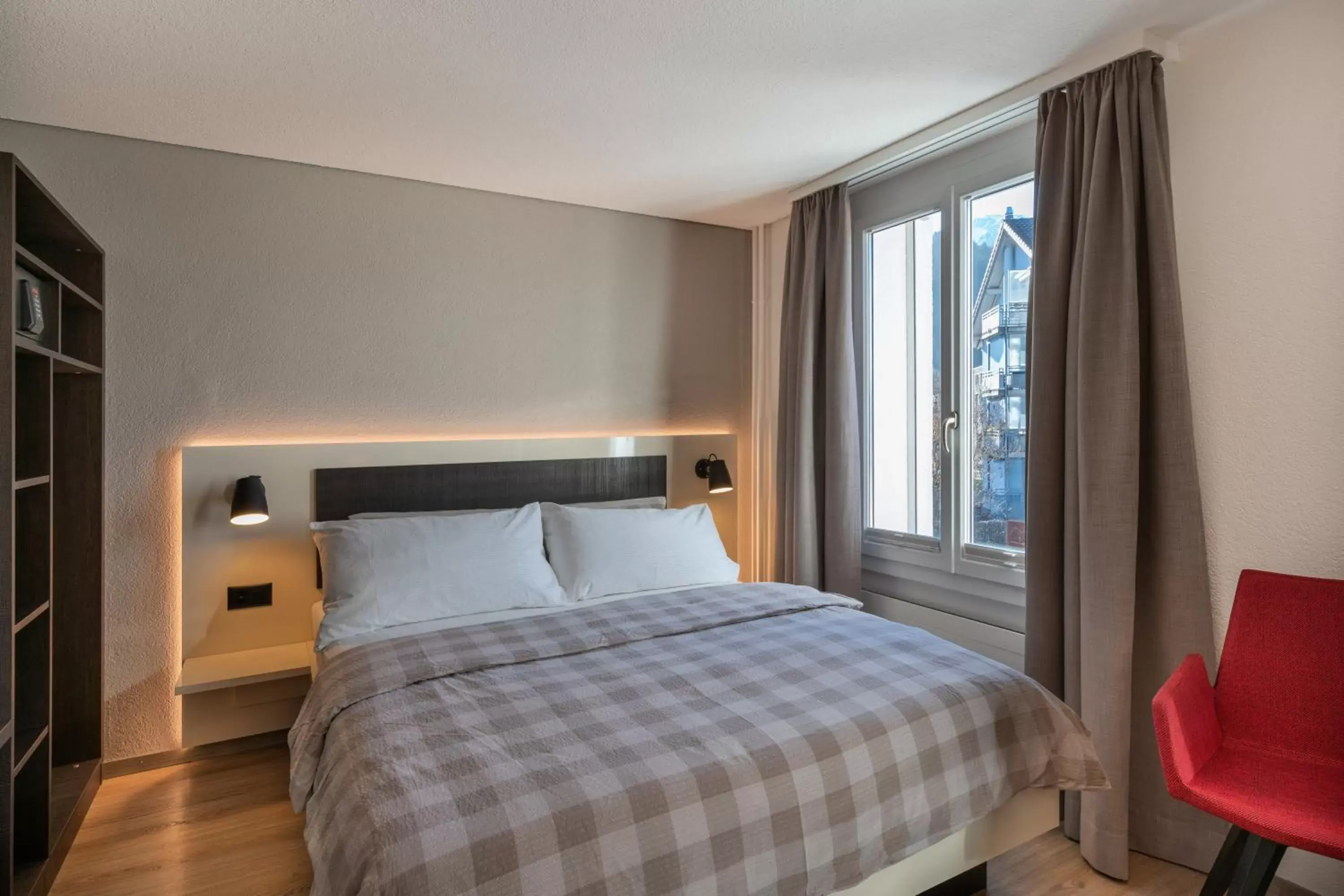 Bed in Hotel Derby Interlaken - Action & Relax Hub