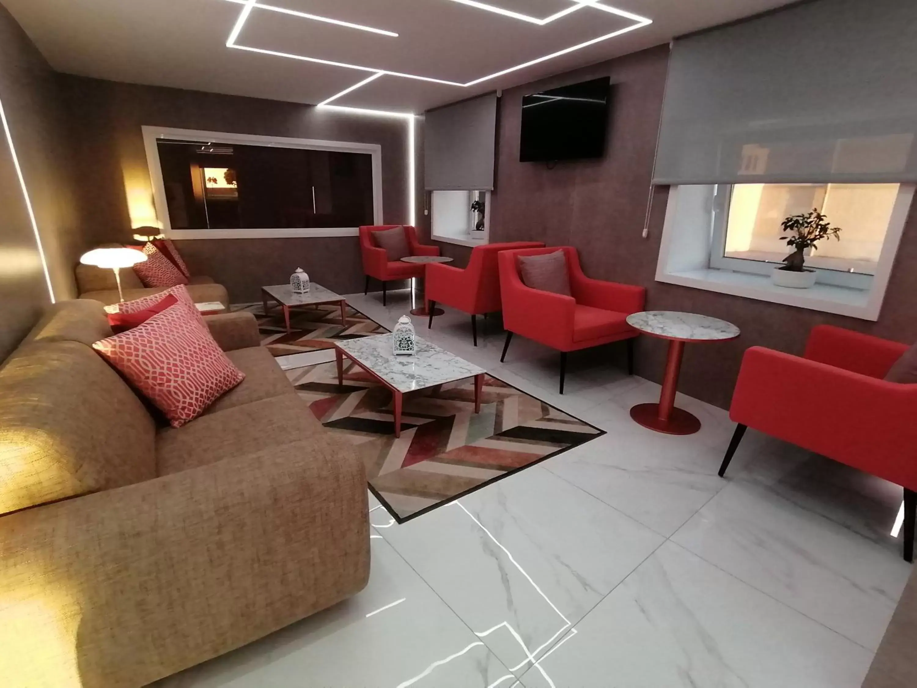 Communal lounge/ TV room, Seating Area in Grande Hotel da Povoa