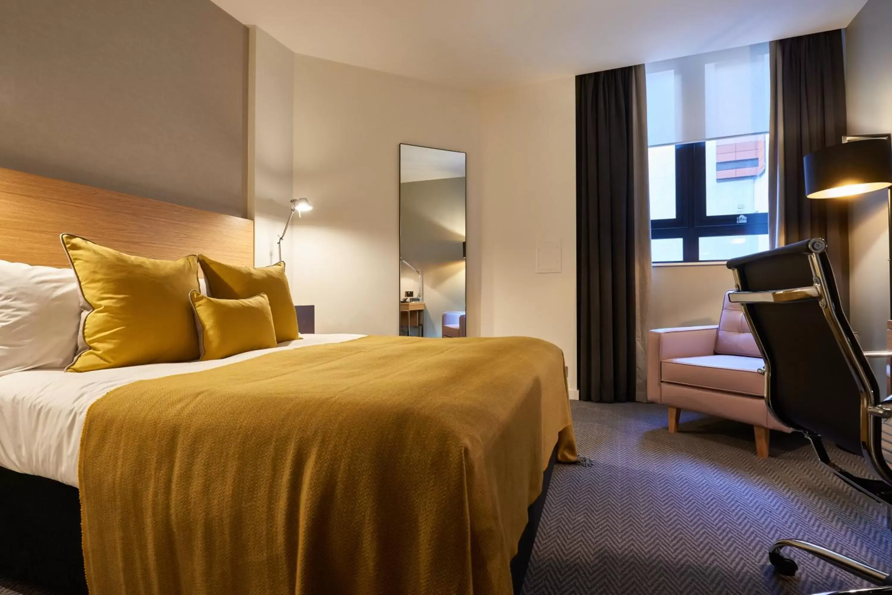 Bed in Apex City Of London Hotel