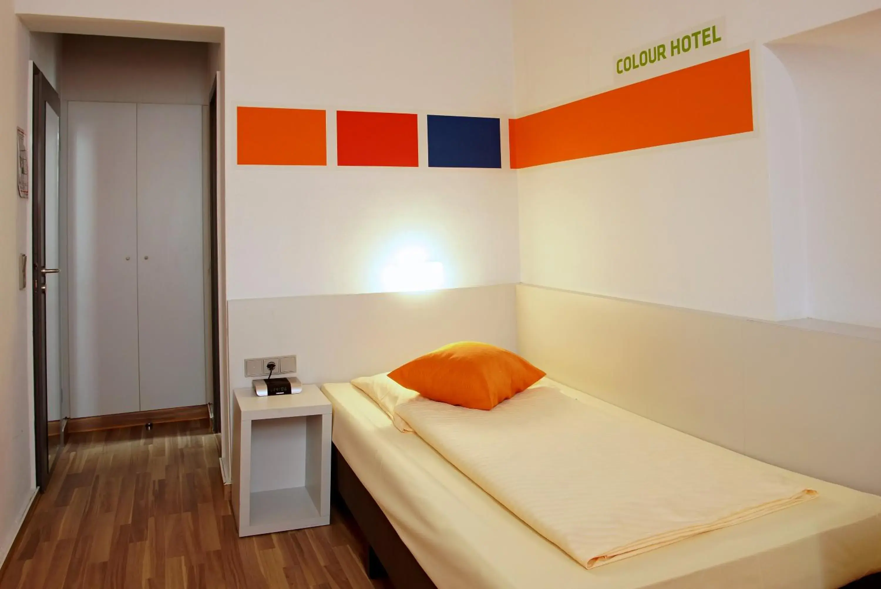 Photo of the whole room, Bed in Colour Hotel