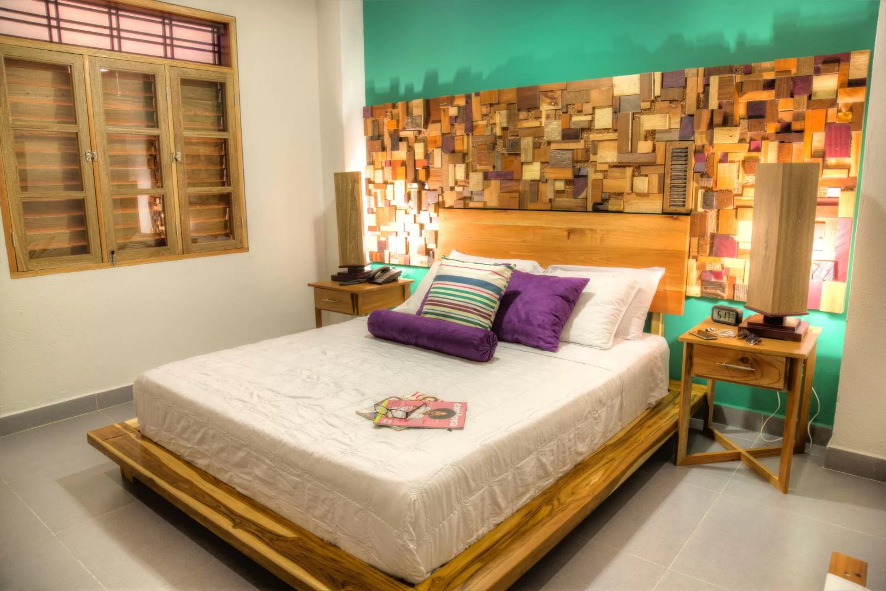 Bed in Casa de Leda, a Kali Hotel