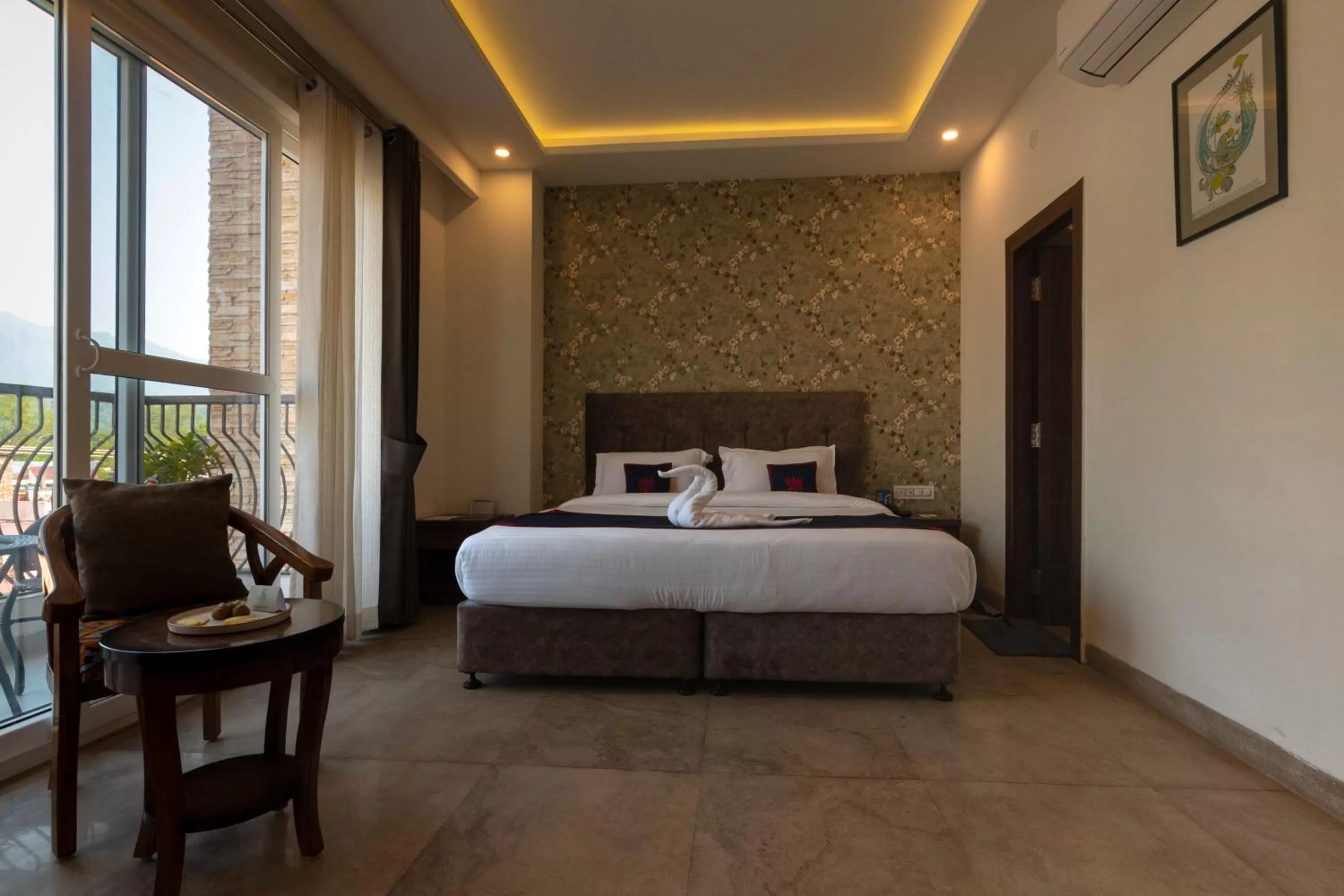 Bed in HOLYWATER Hotel by Ganga Kinare #150 mts from Ganga Ghat Rishikesh