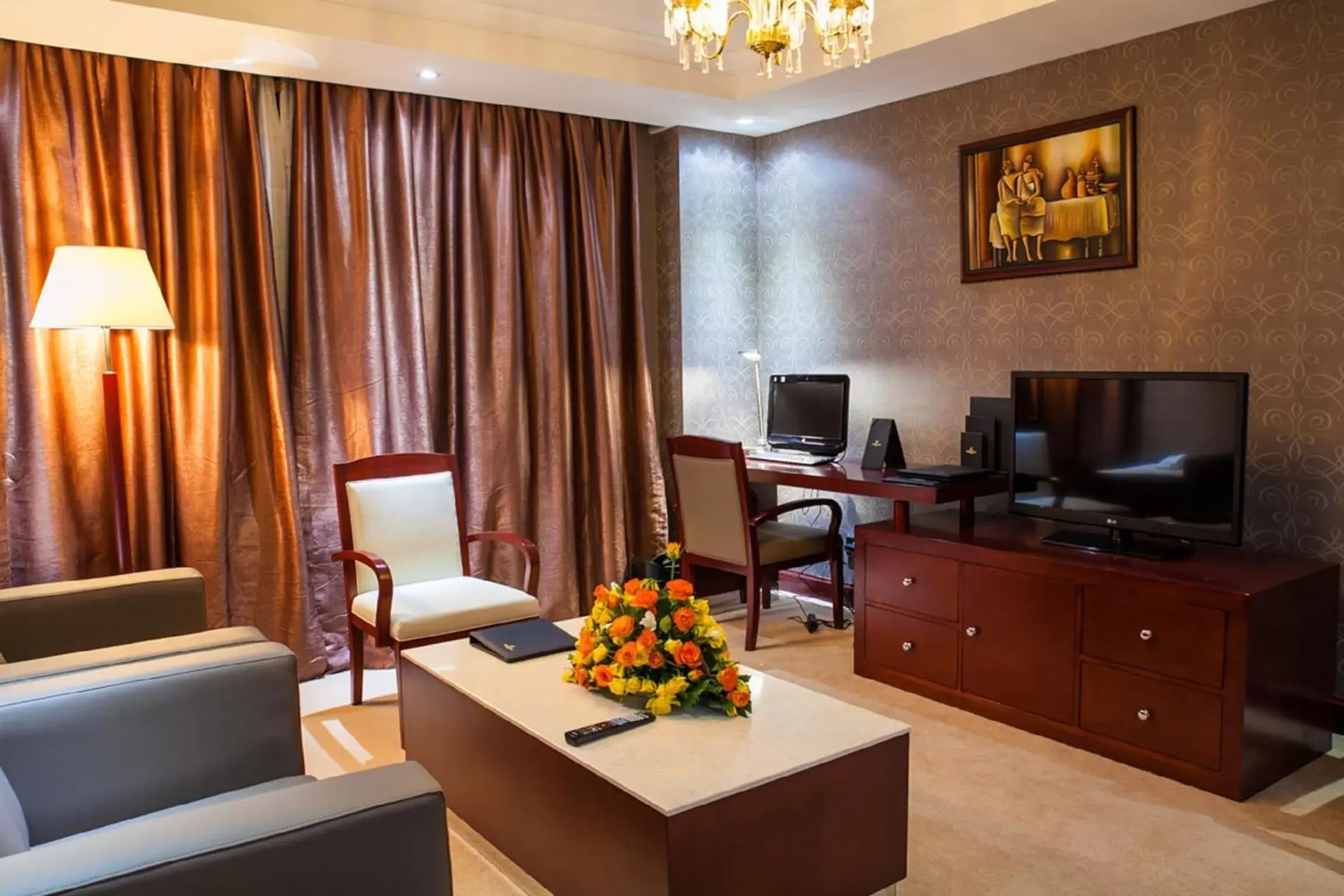 Living room, TV/Entertainment Center in Grand Legacy Hotel