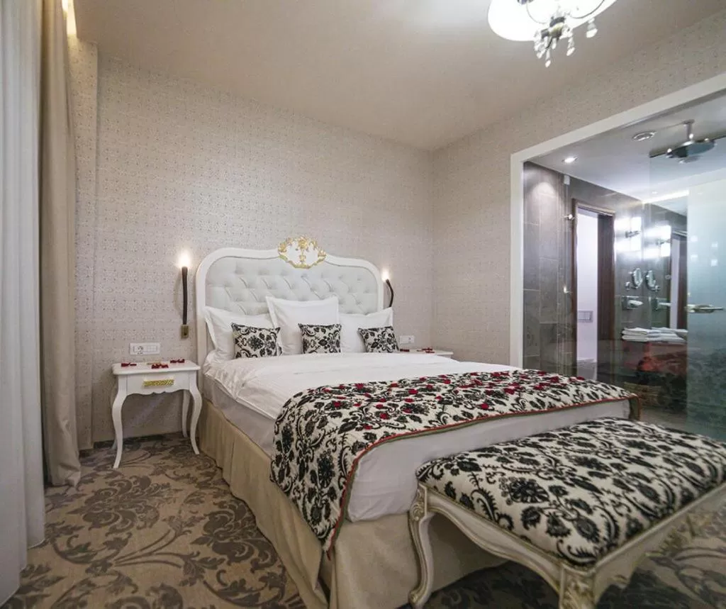 Bed in Pleiada Boutique Hotel & Spa