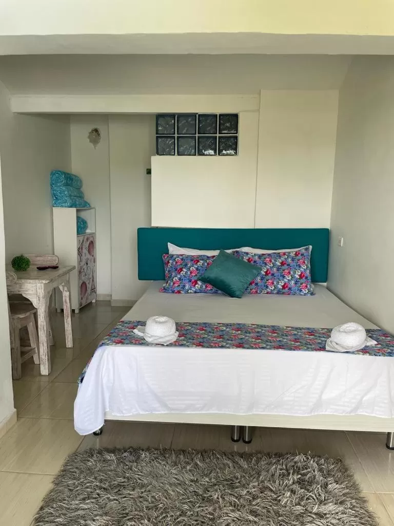 Bed in Paradise Lake Finca Hotel