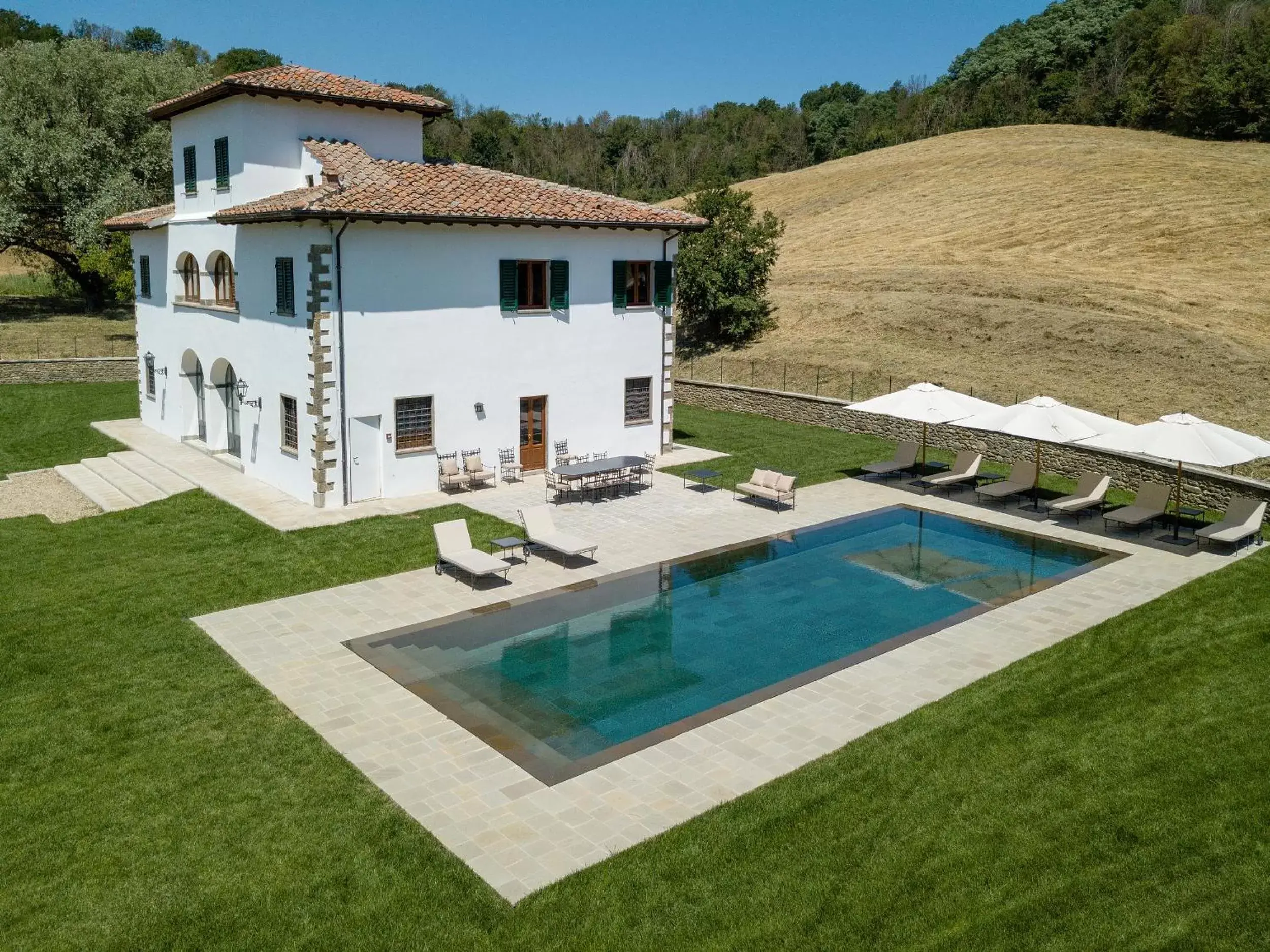 Property building, Swimming Pool in VIESCA Suites & Villas Il Borro Toscana