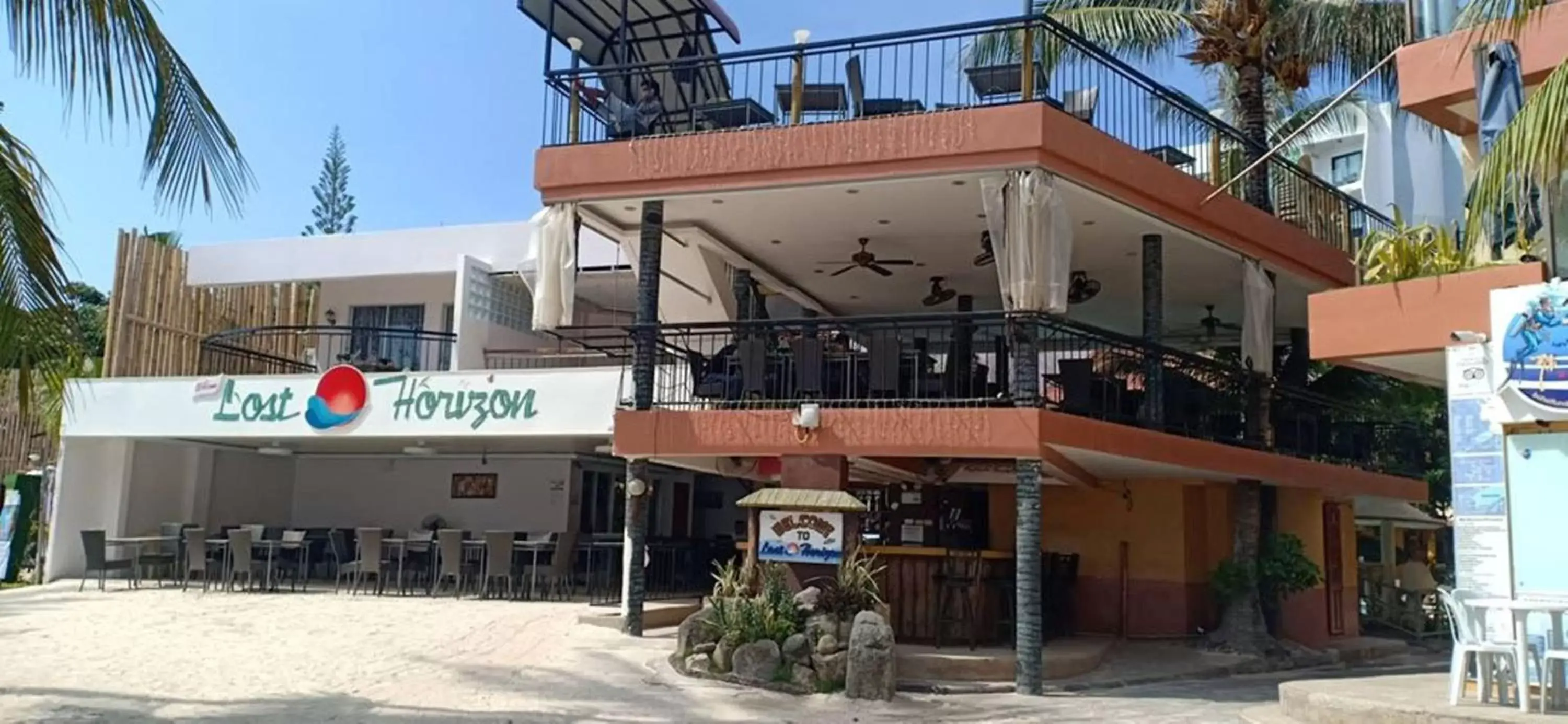 Facade/entrance, Property Building in Lost Horizon Beach Dive Resort