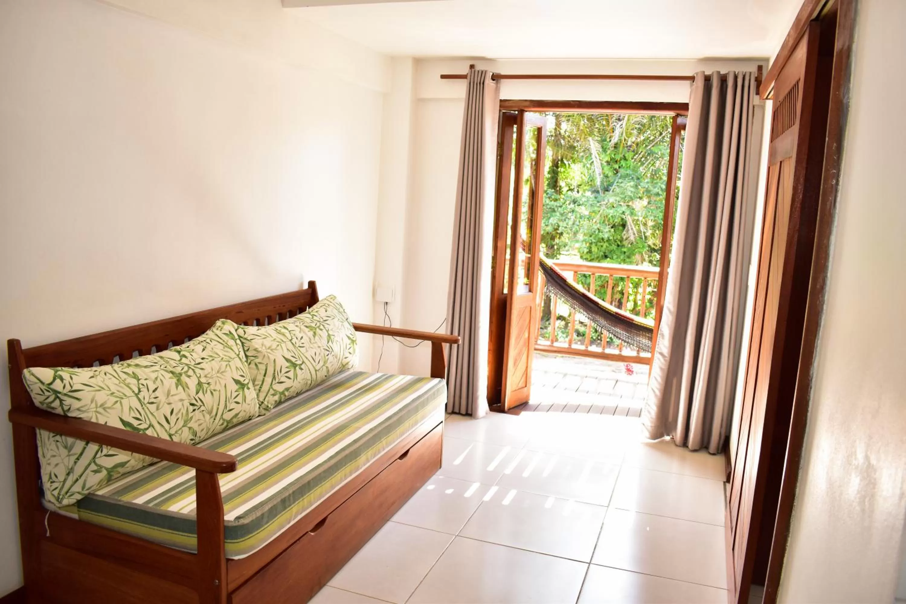 Living room, Bed in Arpoador Flat