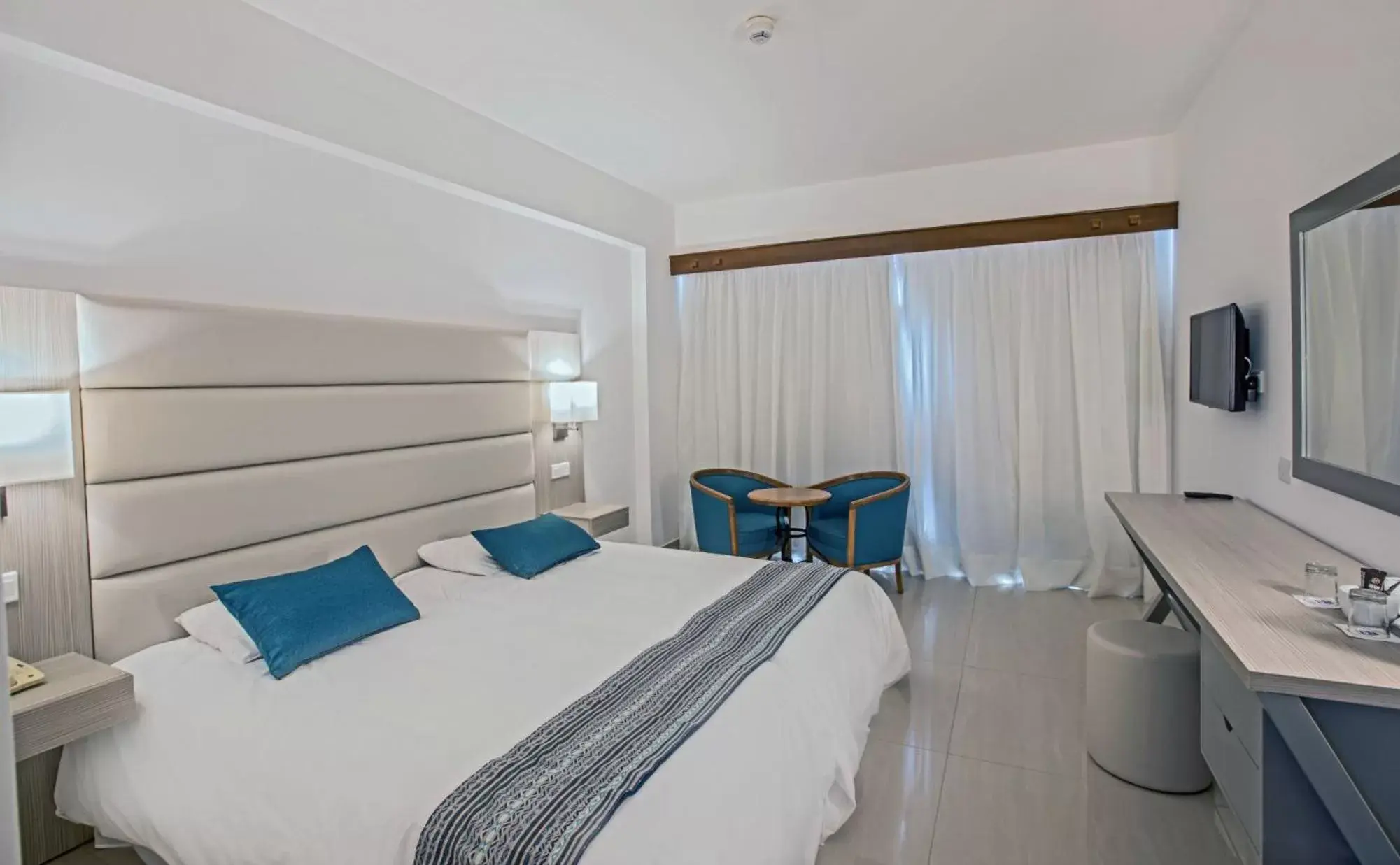 Bed in Anmaria Beach Hotel & Spa