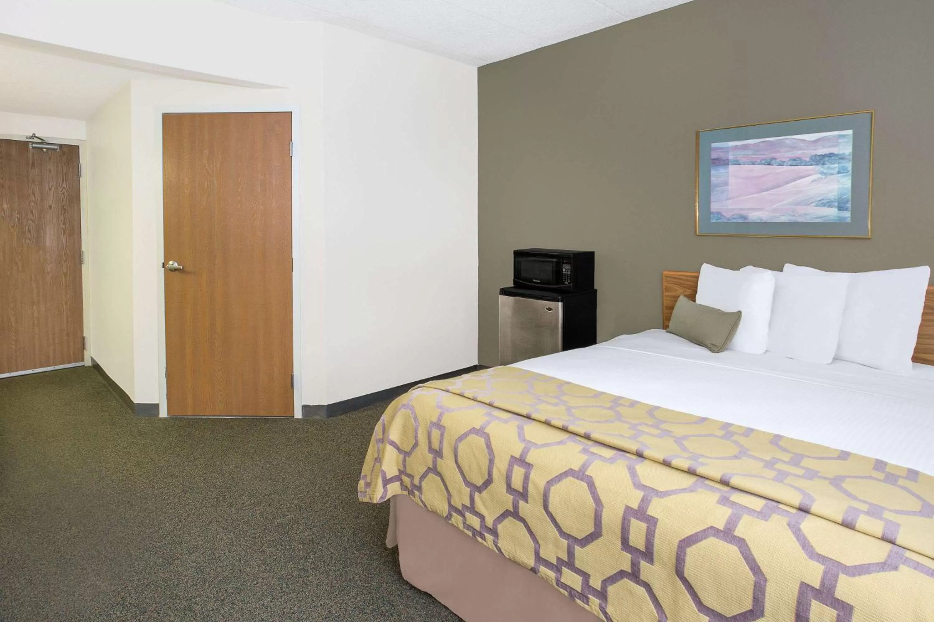 Photo of the whole room, Bed in Baymont by Wyndham Janesville