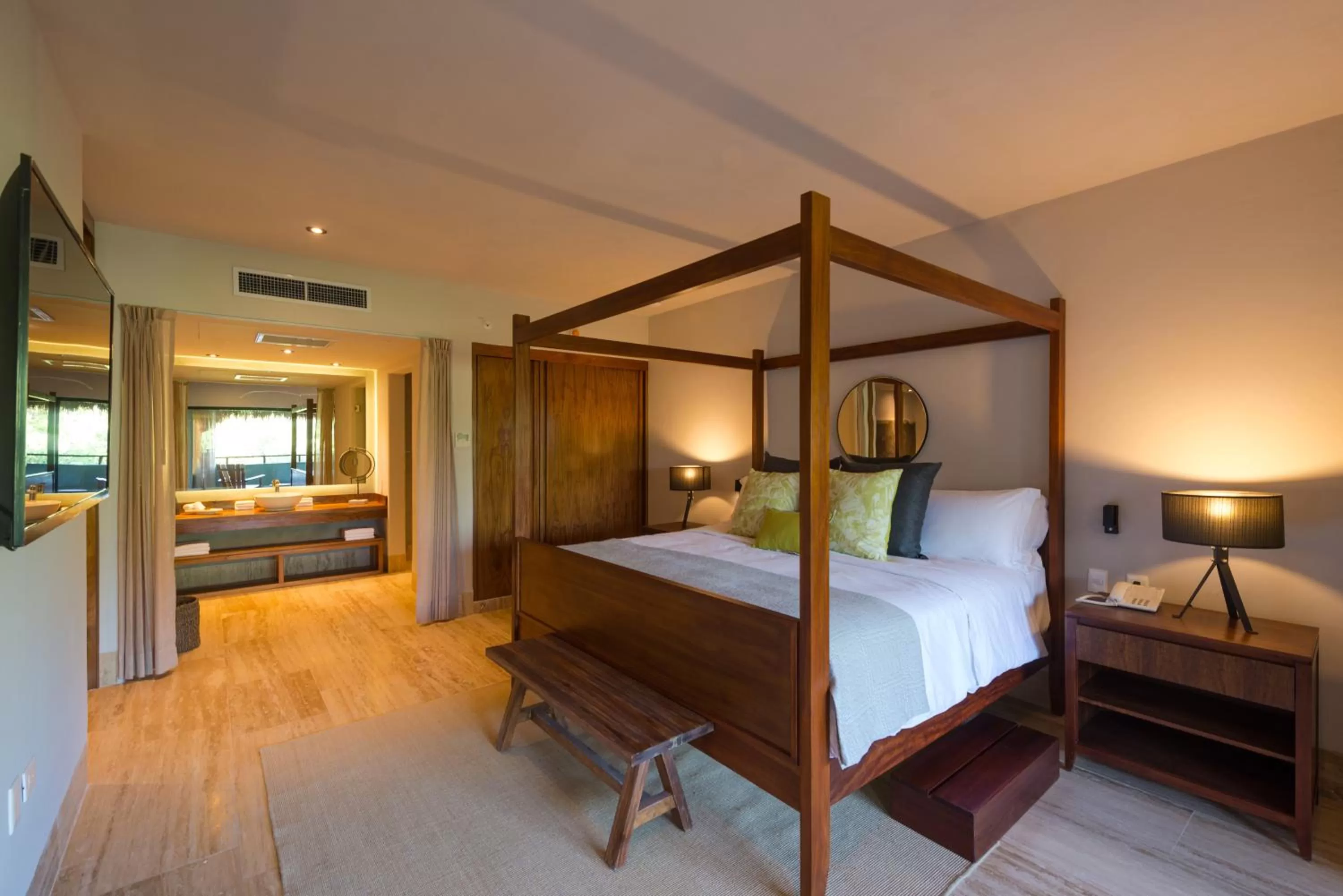 Bed in Kimpton Aluna Resort Tulum by IHG
