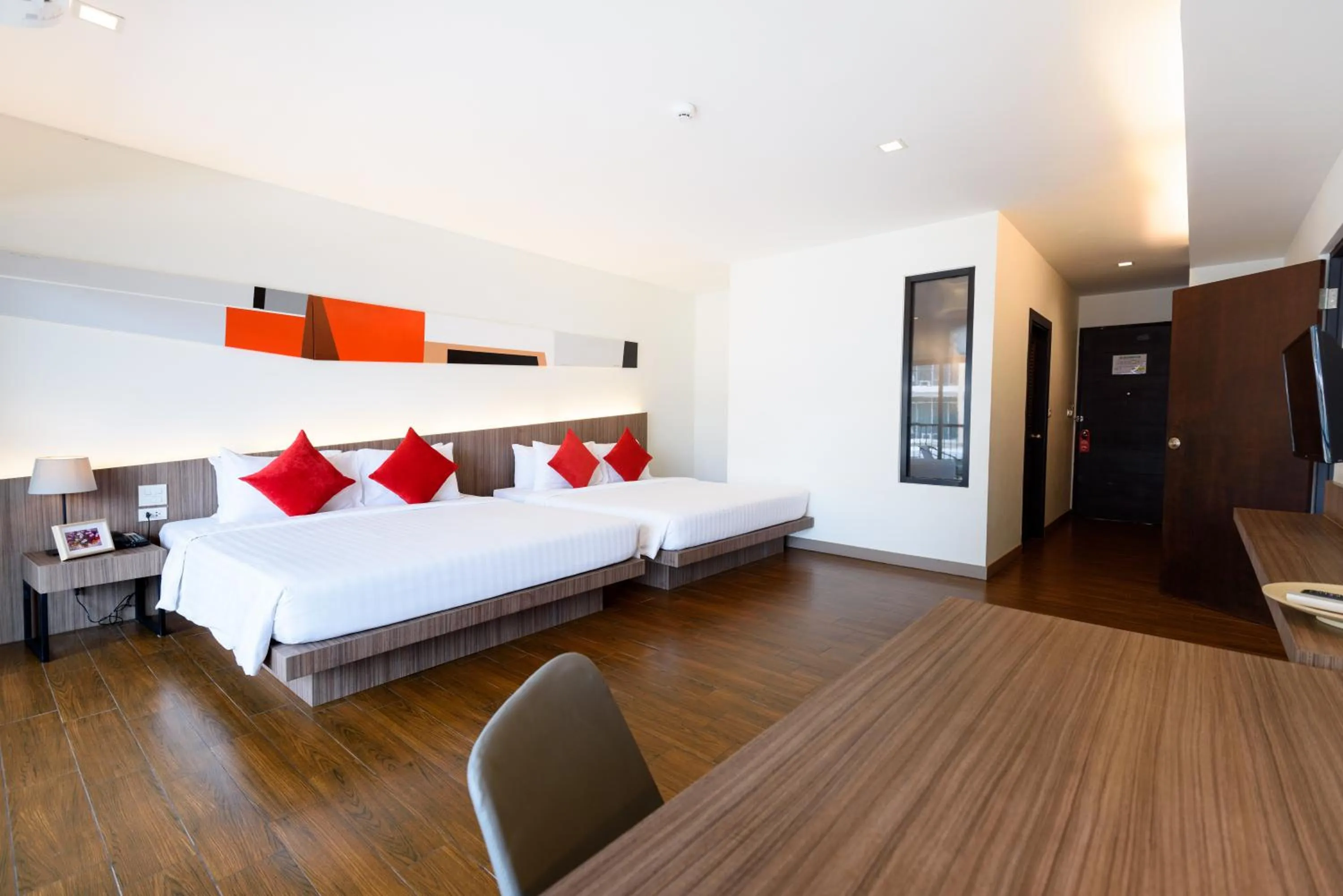 Bed in J Inspired Hotel Pattaya