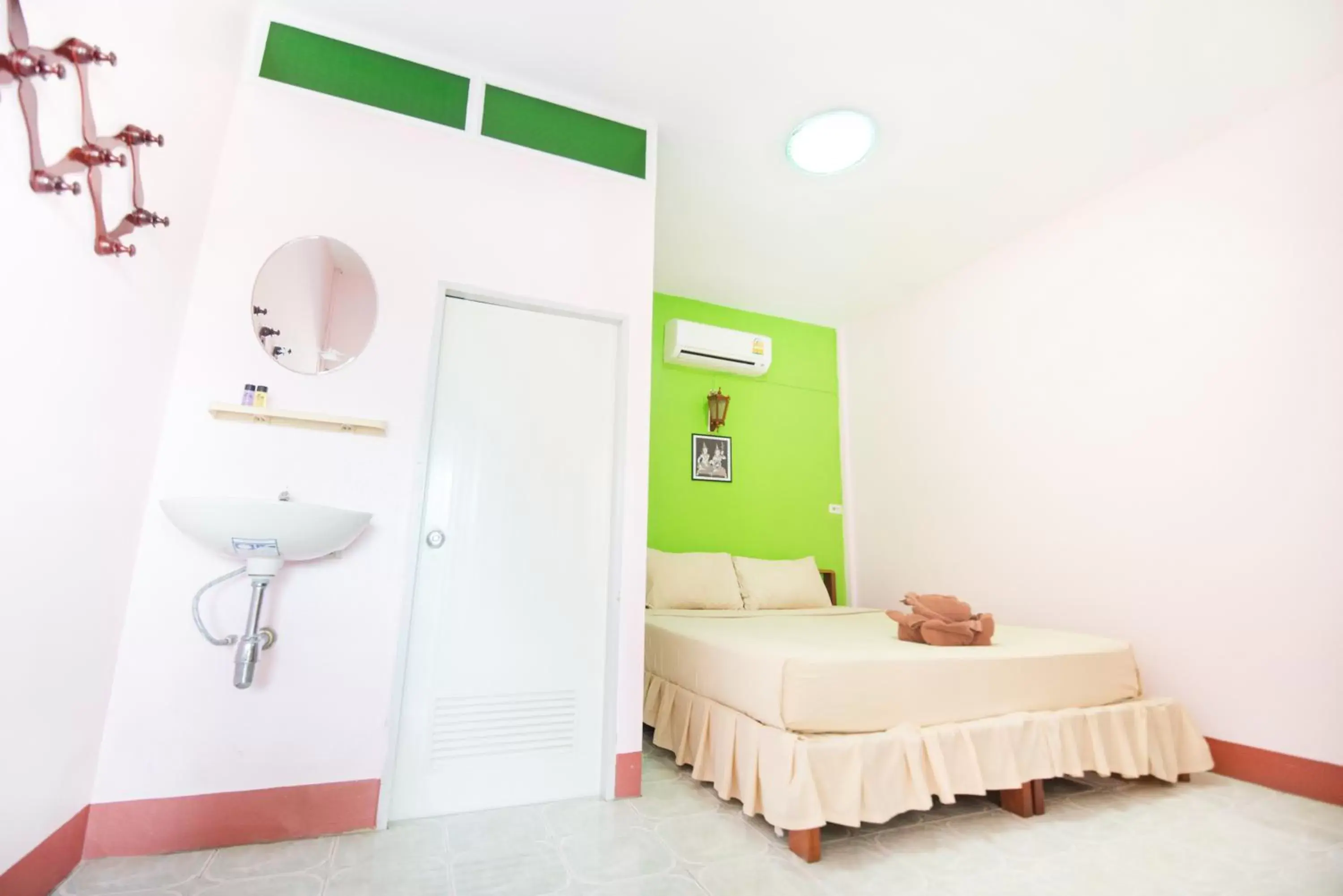 Photo of the whole room, Bathroom in Pongphen Guesthouse - SHA Plus Certified