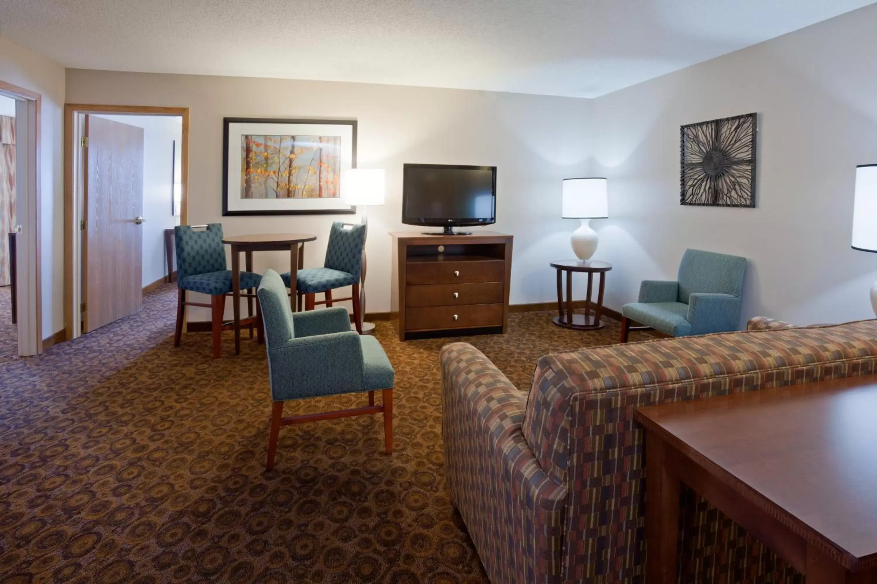 Bedroom, Seating Area in Holiday Inn Express and Suites St. Cloud, an IHG Hotel