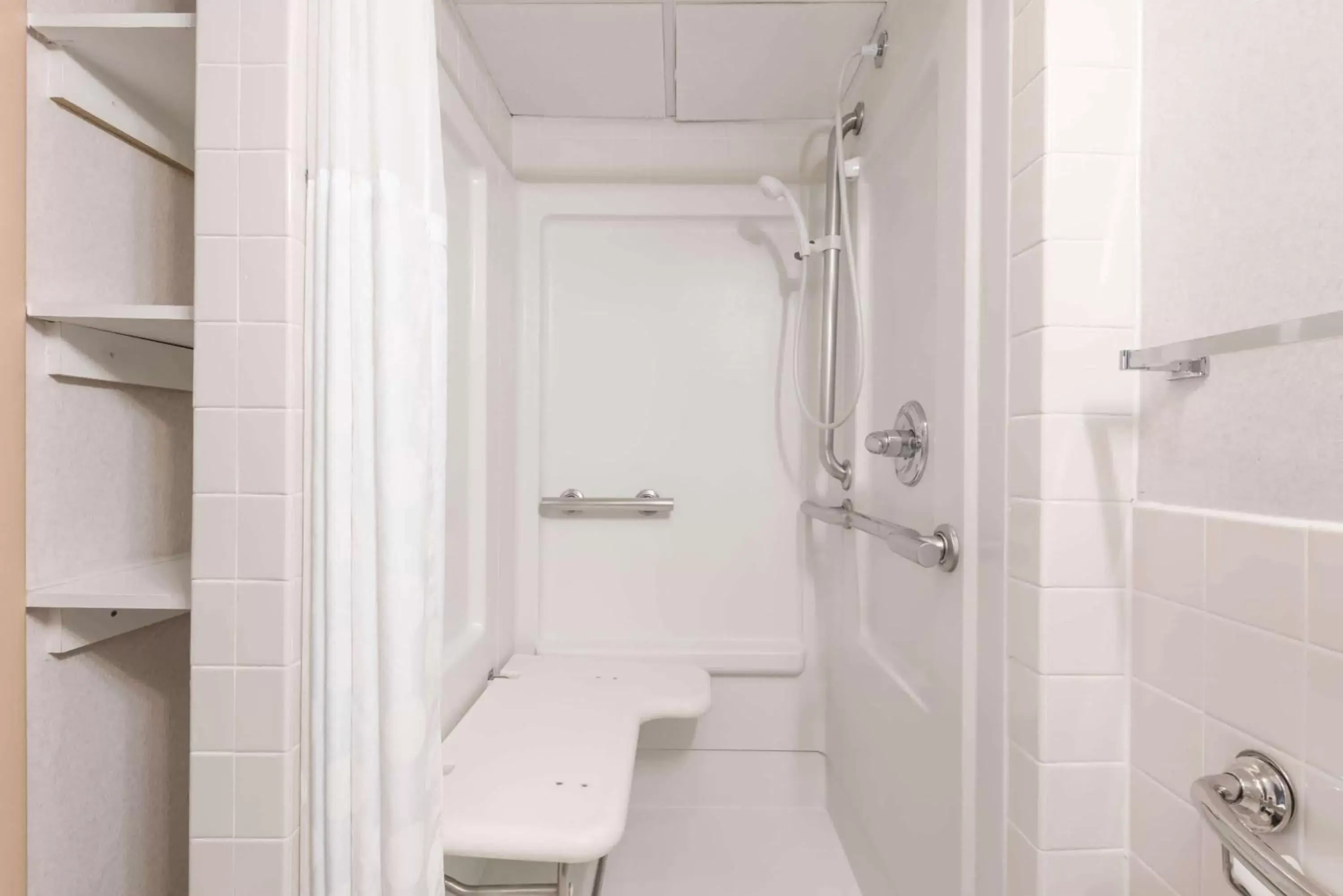 Shower, Bathroom in Ramada by Wyndham State College Hotel & Conference Center