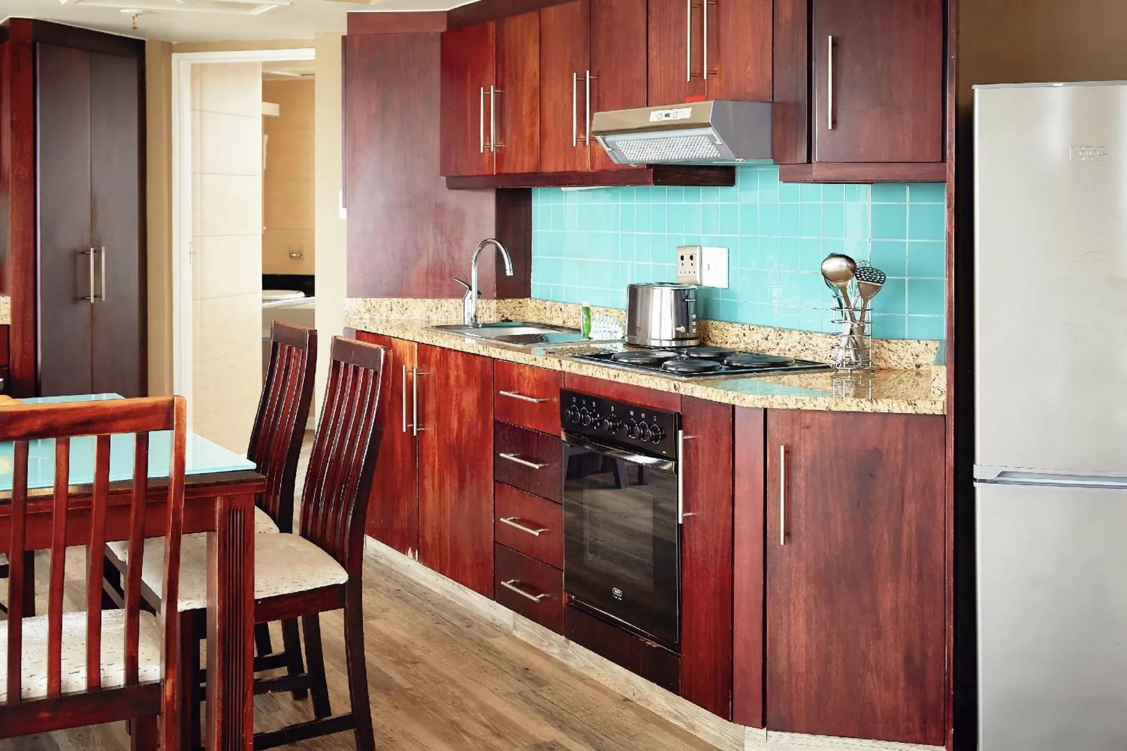 Kitchen or kitchenette in First Group The Palace All-Suite