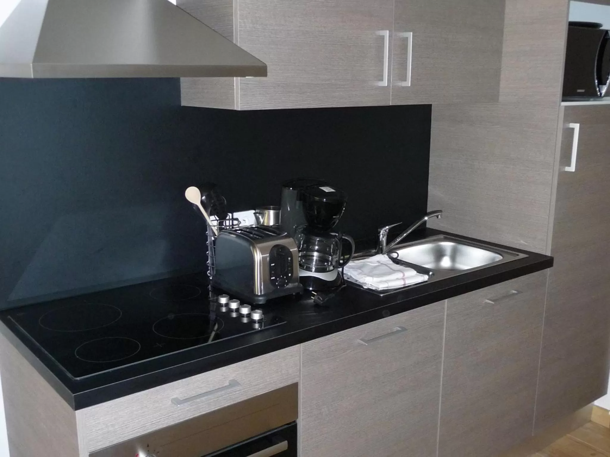 Kitchen or kitchenette in Lagrange Vacances Les Patios Eugénie