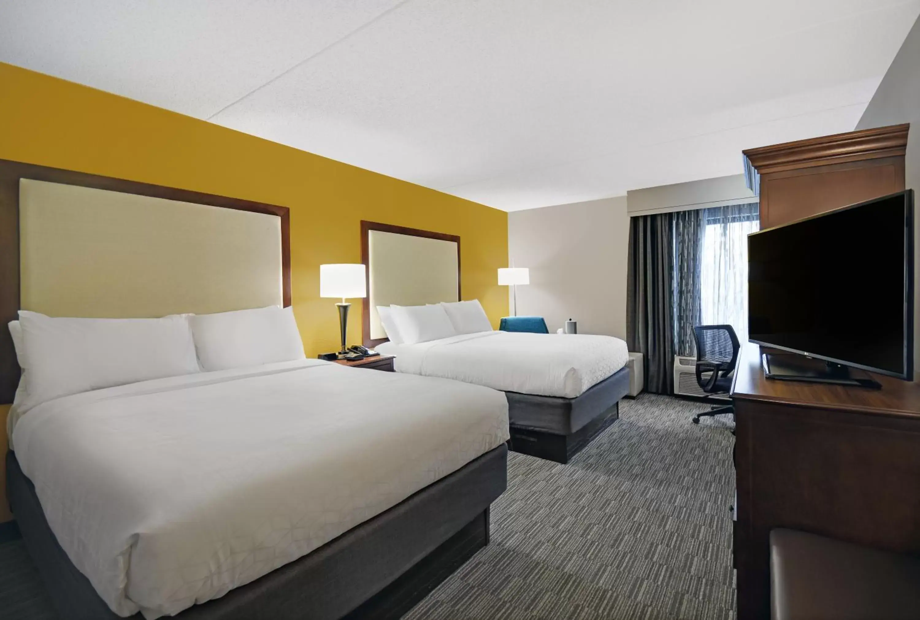 Bed in Holiday Inn Express & Suites Cincinnati Riverfront, an IHG Hotel