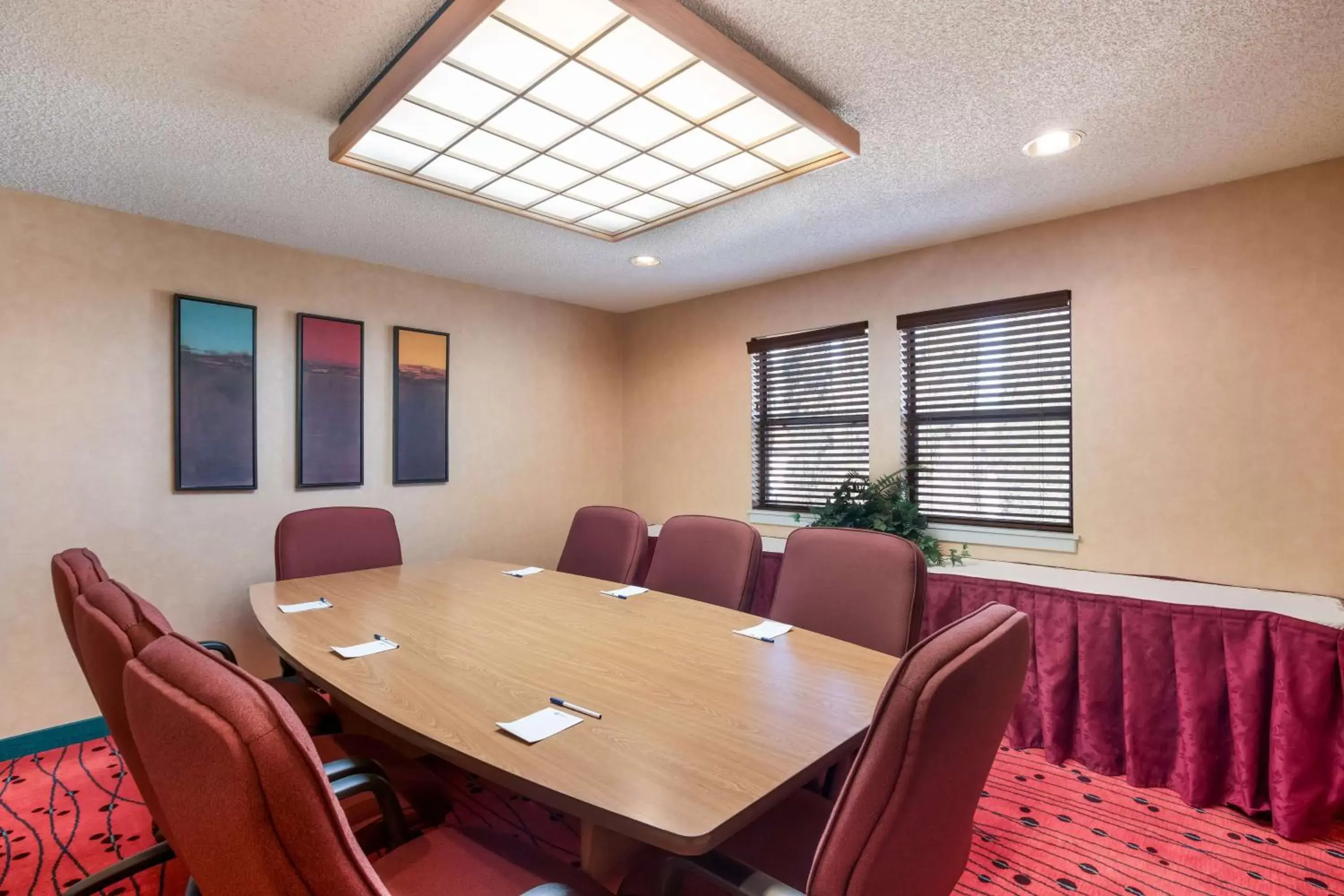 Meeting/conference room in SenS Suites Livermore; SureStay Collection by Best Western