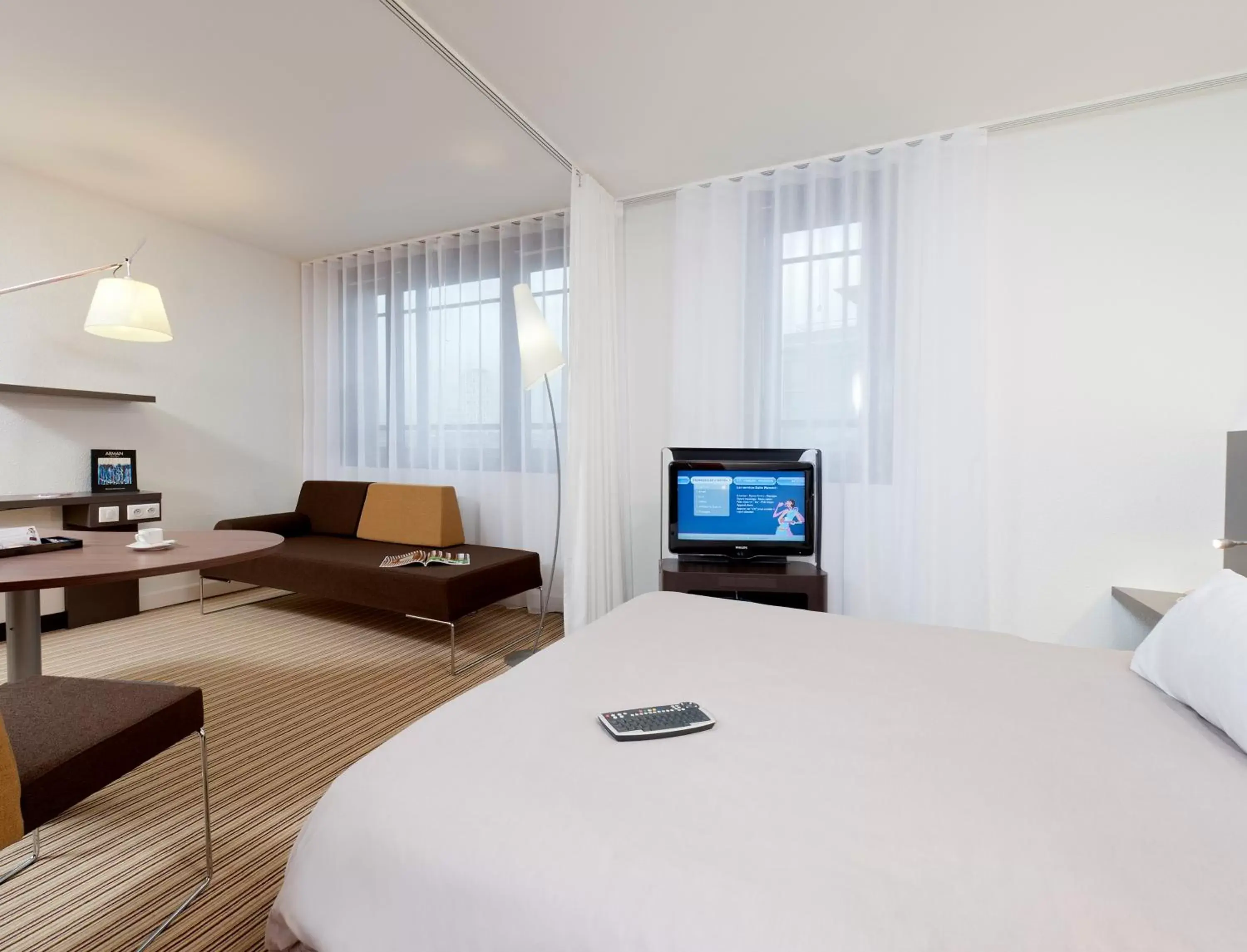 Bed in Novotel Suites Paris Montreuil Vincennes