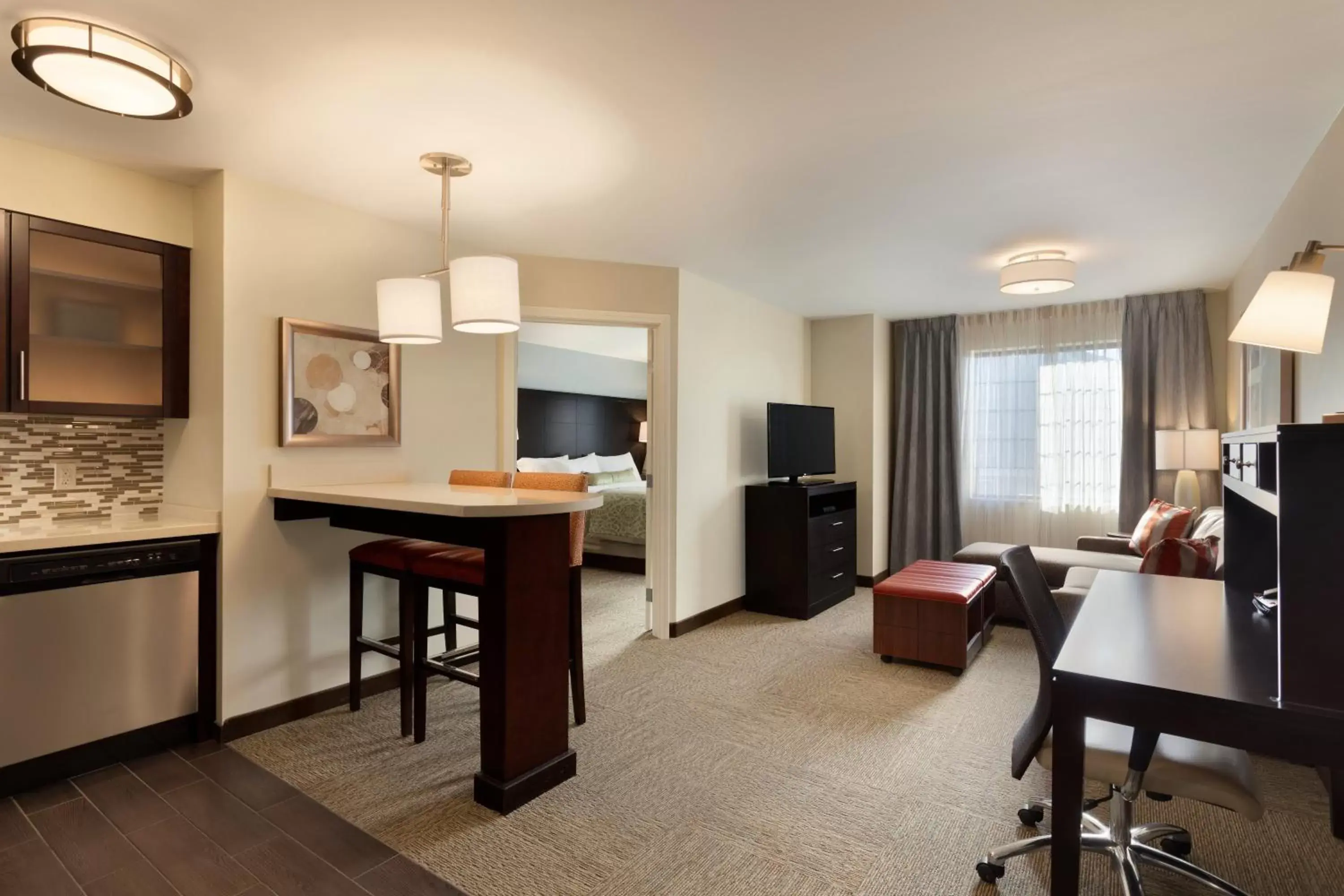 Photo of the whole room, Seating Area in Staybridge Suites Midland, an IHG Hotel