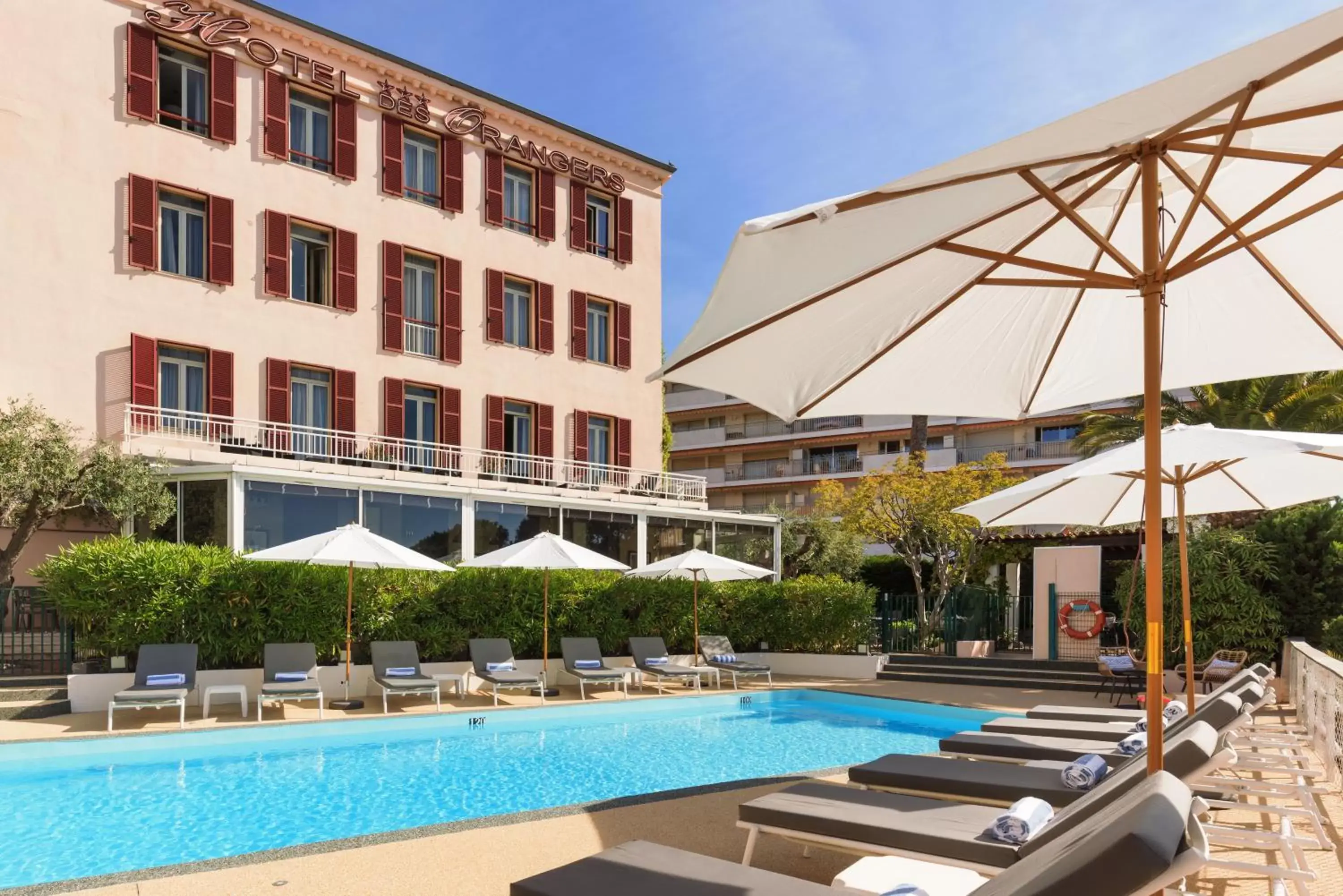 Property building, Swimming Pool in The Originals Boutique, Hôtel des Orangers, Cannes (Inter-Hotel)