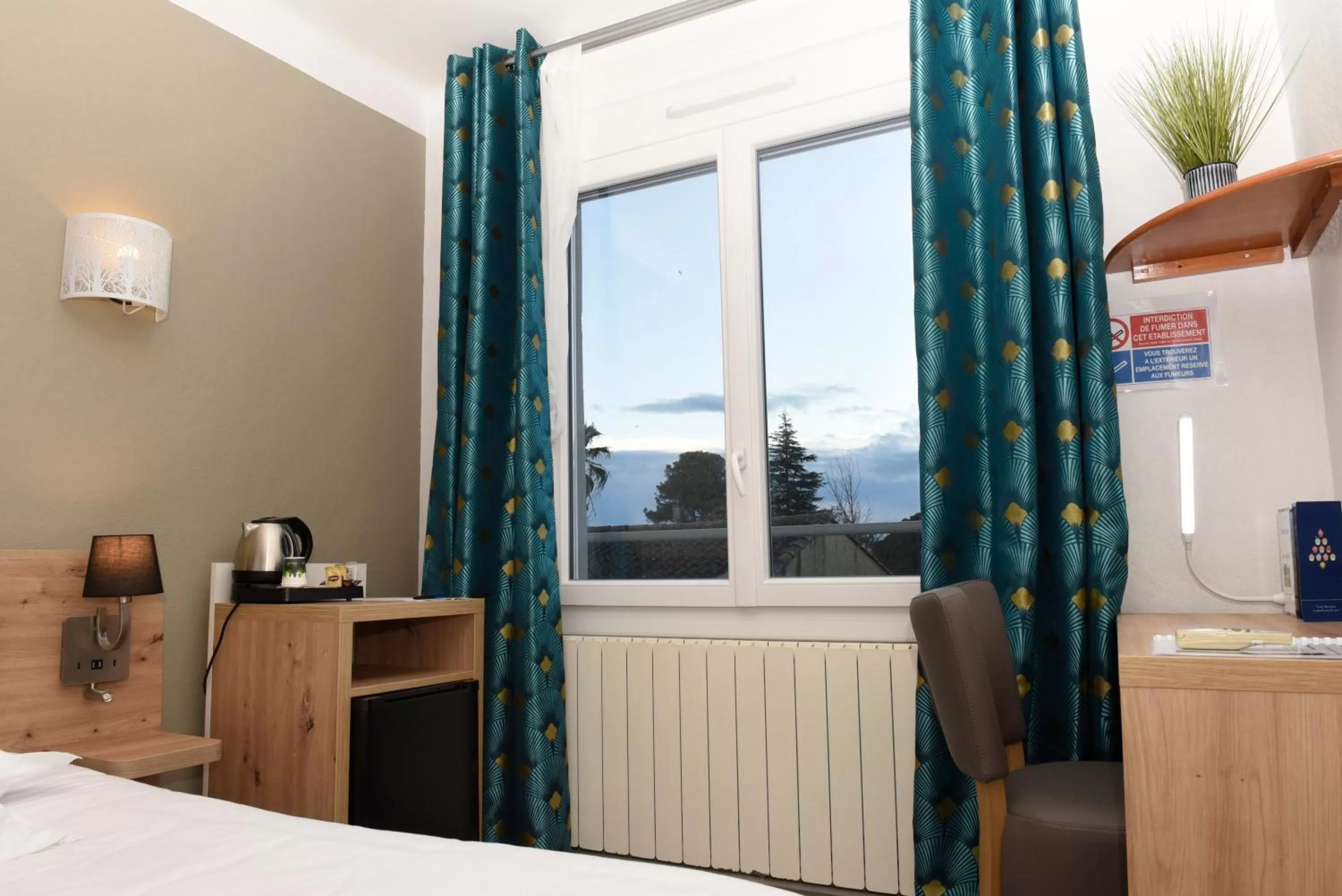 Bedroom in Azur Hôtel