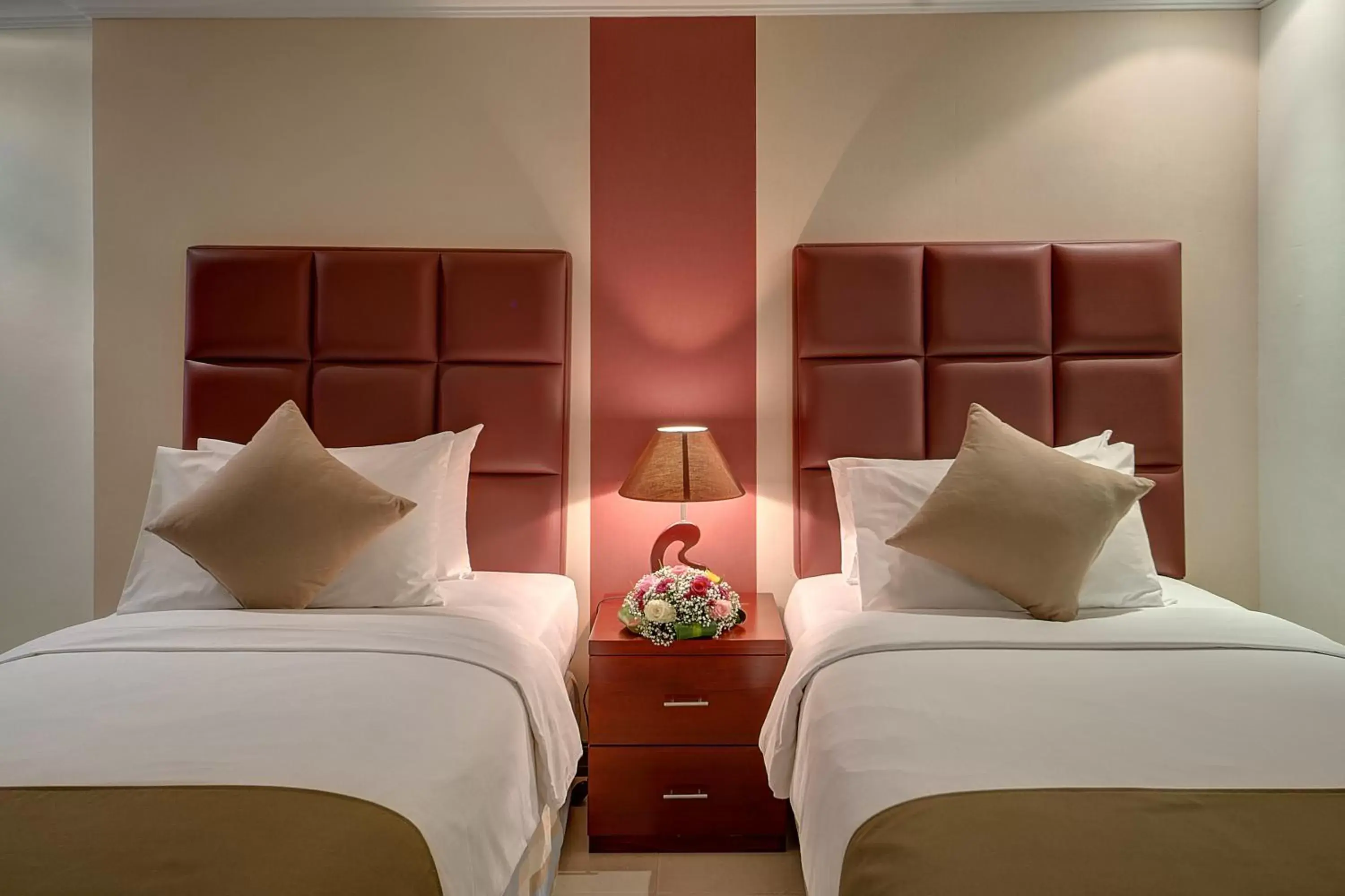 Decorative detail, Bed in Ewan Ajman Suites Hotel